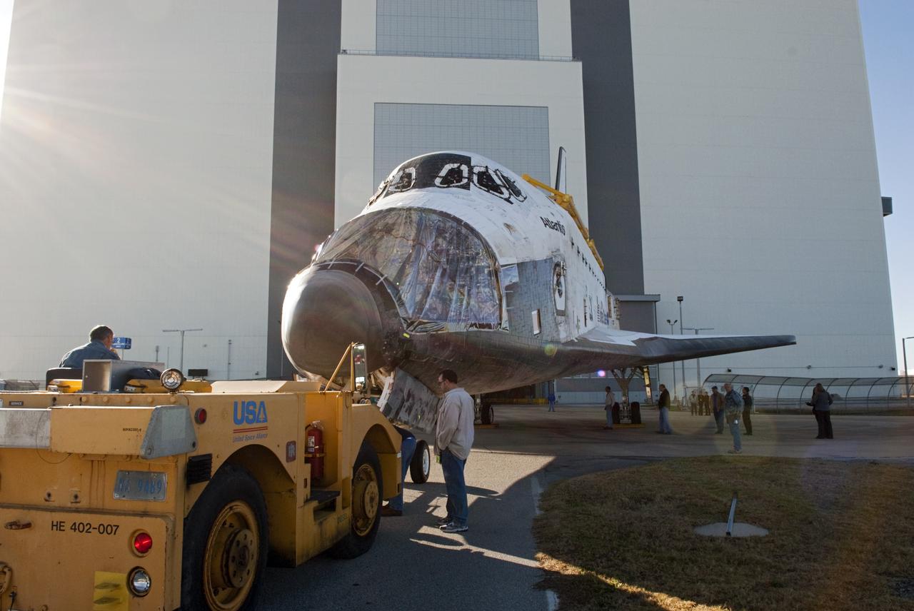 CAPE CANAVERAL, Fla. -- Space shuttle workers line up shuttle Atlantis for its move into the transfer aisle of the Vehicle Assembly Building (VAB) at NASA's Kennedy Space Center in Florida. Atlantis is being moved to the VAB from Orbiter Processing Facility-2. Atlantis will be stored temporarily in the VAB while transition and retirement processing resumes on shuttle Endeavour in the processing hangar. Endeavour is being prepared for public display at the California Science Center in Los Angeles. A groundbreaking was held Jan. 18 for Atlantis' future home -- a 65,000-square-foot exhibit in Shuttle Plaza at the Kennedy Space Center Visitor Complex. For additional information, visit http://www.nasa.gov/shuttle. Photo credit: NASA/Charisse Nahser