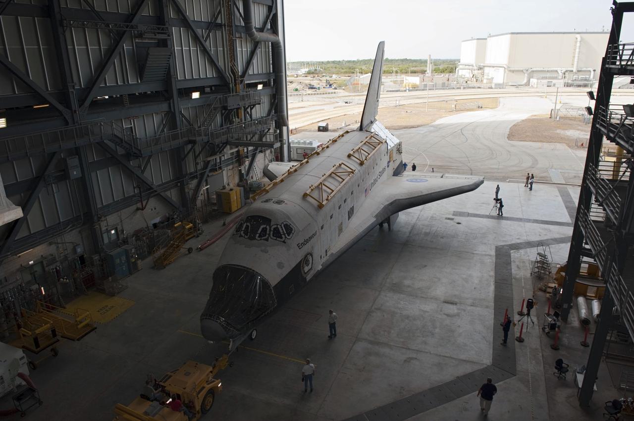 CAPE CANAVERAL, Fla. – Inside the Vehicle Assembly Building at NASA’s Kennedy Space Center in Florida, technicians prepare space shuttle Endeavour for its move to Orbiter Processing Facility-2 (OPF-2). Shuttle Endeavour will remain in OPF-2 so that the orbiter maneuvering system (OMS) pods and forward reaction control system can be installed. Technicians also will offload water and Freon gas from lines located in Endeavour’s midbody. The work is part of Endeavour’s transition and retirement processing. The spacecraft is being prepared for public display at the California Science Center in Los Angeles. Endeavour flew 25 missions, spent 299 days in space, orbited Earth 4,671 times and traveled 122, 883, 151 miles over the course of its 19-year career. Endeavour’s STS-134 and final mission was completed after landing on June 1, 2011. Photo credit: Kim Shiflett