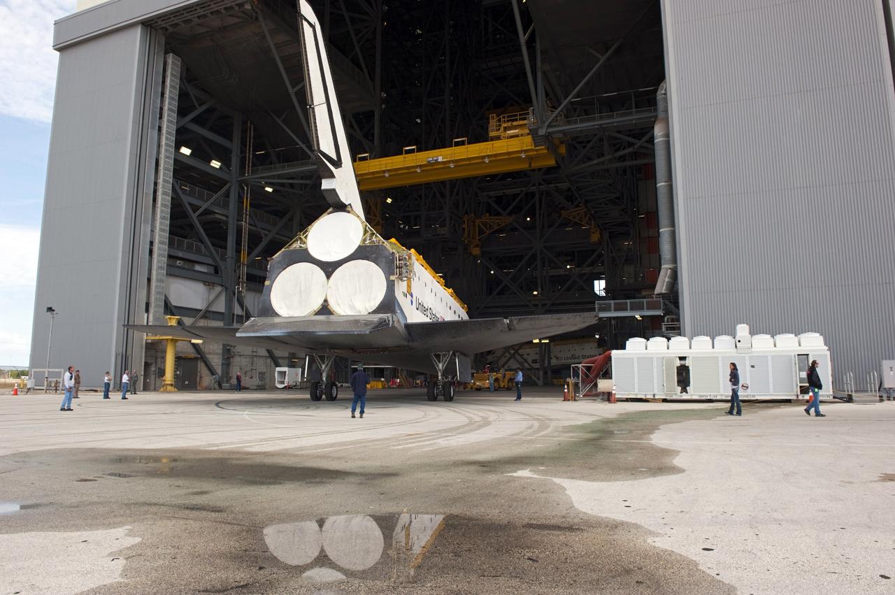 CAPE CANAVERAL, Fla. – Space shuttle Endeavour is backed away from the Vehicle Assembly Building at NASA’s Kennedy Space Center in Florida so that it can be towed to Orbiter Processing Facility-2 (OPF-2). Shuttle Endeavour will remain in OPF-2 so that the orbiter maneuvering system (OMS) pods and forward reaction control system can be installed. Technicians also will offload water and Freon gas from lines located in Endeavour’s midbody. The work is part of Endeavour’s transition and retirement processing. The spacecraft is being prepared for public display at the California Science Center in Los Angeles. Endeavour flew 25 missions, spent 299 days in space, orbited Earth 4,671 times and traveled 122, 883, 151 miles over the course of its 19-year career. Endeavour’s STS-134 and final mission was completed after landing on June 1, 2011. Photo credit: Kim Shiflett