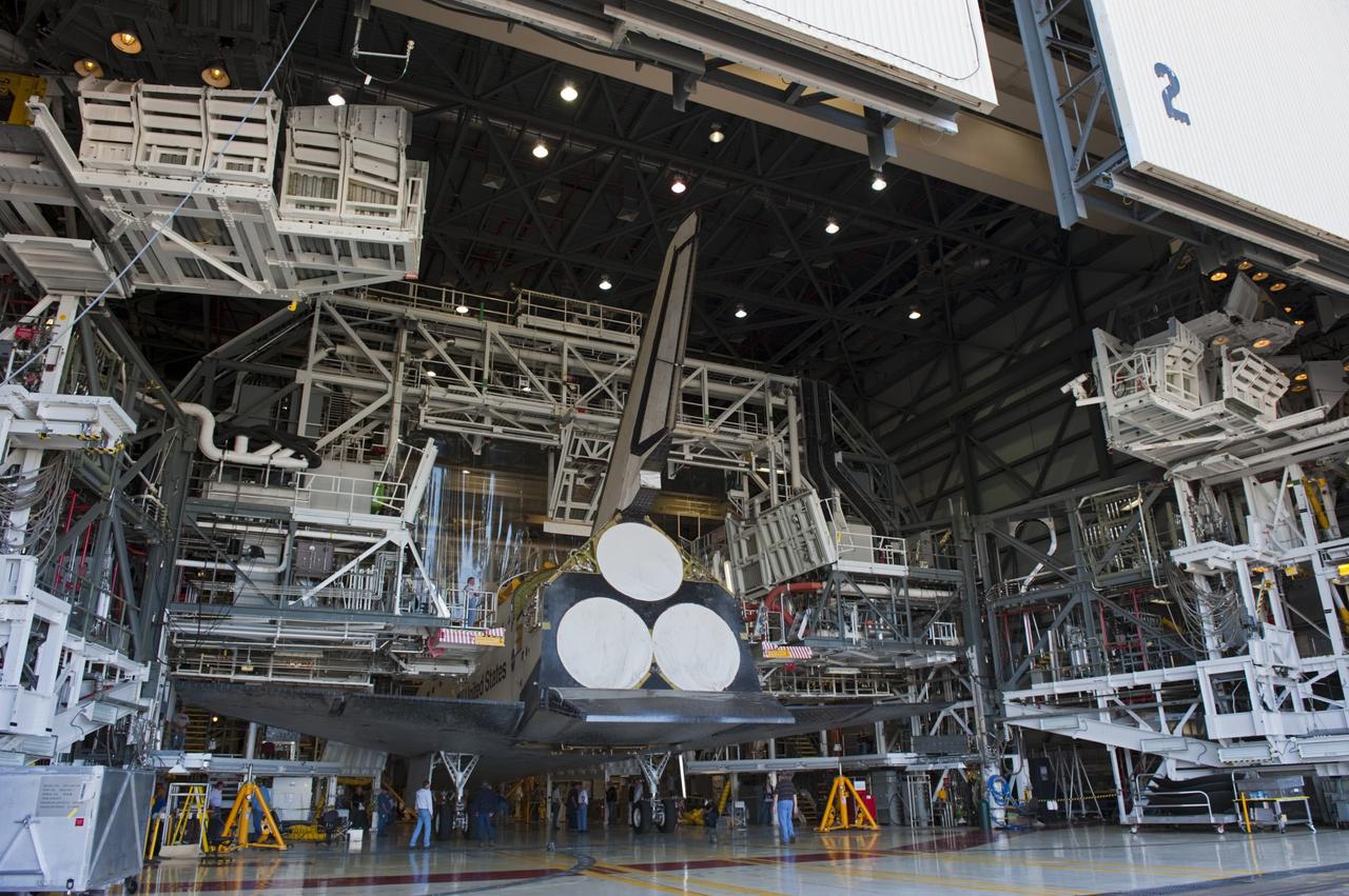 CAPE CANAVERAL, Fla. – At NASA’s Kennedy Space Center in Florida, space shuttle Endeavour is safed inside Orbiter Processing Facility-2 (OPF-2) after being towed from the Vehicle Assembly Building. Shuttle Endeavour will remain in OPF-2 so that the orbiter maneuvering system (OMS) pods and forward reaction control system can be installed. Technicians also will offload water and Freon gas from lines located in Endeavour’s midbody. The work is part of Endeavour’s transition and retirement processing. The spacecraft is being prepared for public display at the California Science Center in Los Angeles. Endeavour flew 25 missions, spent 299 days in space, orbited Earth 4,671 times and traveled 122, 883, 151 miles over the course of its 19-year career. Endeavour’s STS-134 and final mission was completed after landing on June 1, 2011. Photo credit: Kim Shiflett