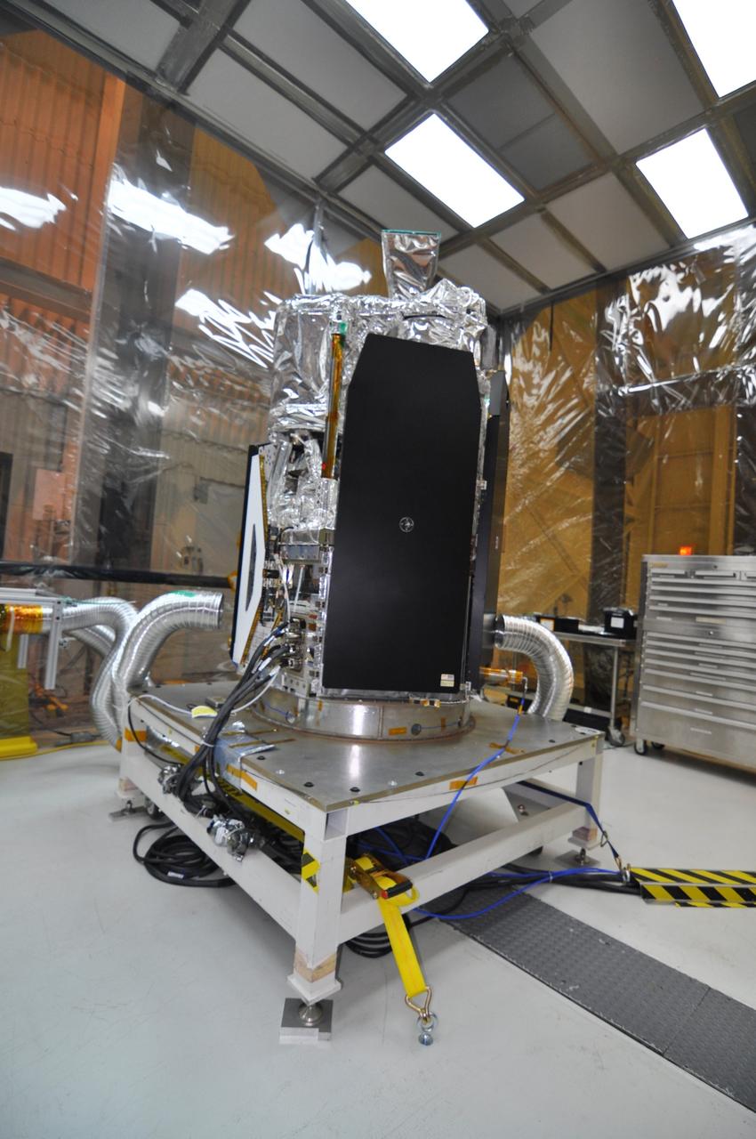 VANDENBERG AIR FORCE BASE, Calif. -- In a clean room at Vandenberg Air Force Base's processing facility in California, NASA's NuSTAR spacecraft undergoes a limited performance test, a two-day functional checkout of the spacecraft. A Pegasus XL rocket is set to launch NuSTAR into space. Once the rocket and spacecraft are processed at Vandenberg, they will be flown on the Orbital Sciences’ L-1011 carrier aircraft to the Ronald Reagan Ballistic Missile Defense Test Site at the Pacific Ocean’s Kwajalein Atoll for launch. The high-energy x-ray telescope will conduct a census for black holes, map radioactive material in young supernovae remnants, and study the origins of cosmic rays and the extreme physics around collapsed stars. For more information, visit science.nasa.gov/missions/nustar/. Photo credit: NASA/Randy Beaudoin, VAFB