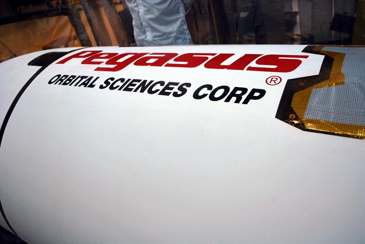 VANDENBERG AIR FORCE BASE, Calif. – In processing facility 1555 at Vandenberg Air Force Base in California, segments of a Pegasus payload fairing for NASA's Nuclear Spectroscopic Telescope Array (NuSTAR) mission have been cleaned and inspected, a milestone in launch preparations. The fairing will protect the spacecraft from the heat and aerodynamic pressure generated during ascent to orbit aboard an Orbital Sciences Pegasus XL rocket in March. Once processing of the rocket and spacecraft are completed at Vandenberg, they will be flown aboard an L-1011 carrier aircraft to the Ronald Reagan Ballistic Missile Defense Test Site on the Pacific Ocean’s Kwajalein Atoll for launch. NuSTAR, a high-energy x-ray telescope, will conduct a census for black holes, map radioactive material in young supernovae remnants, and study the origins of cosmic rays and the extreme physics around collapsed stars. For more information, visit http://www.nasa.gov/nustar. Photo credit: NASA/Randy Beaudoin, VAFB