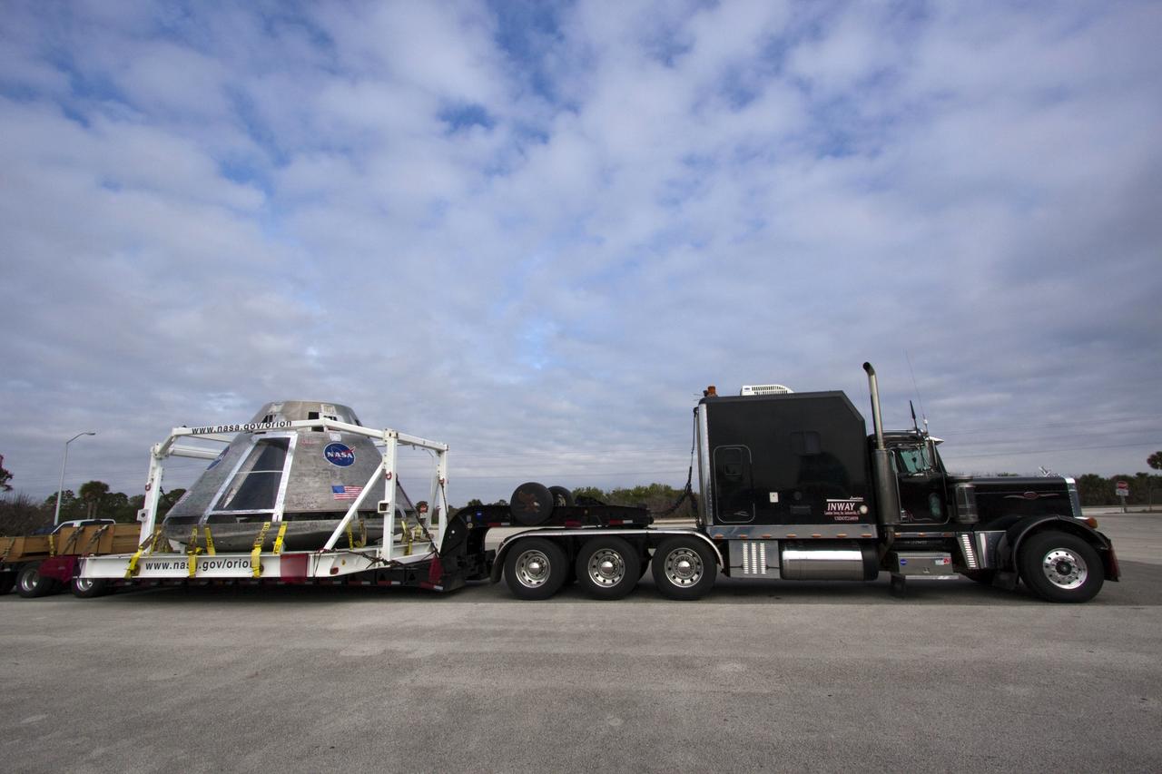 CAPE CANAVERAL, Fla. – A test version of NASA’s Orion spacecraft completed a cross-country journey at NASA’s Kennedy Space Center in Florida on Feb. 8, after giving residents in three states the chance to see a full scale mockup of the craft that will take humans into deep space. The capsule will be stored in Kennedy’s Multi-Payload Processing Facility.      The test vehicle was used by ground crews in advance of the launch abort system flight test that took place in New Mexico in 2010. Photo Credit: NASA/Jim Grossmann