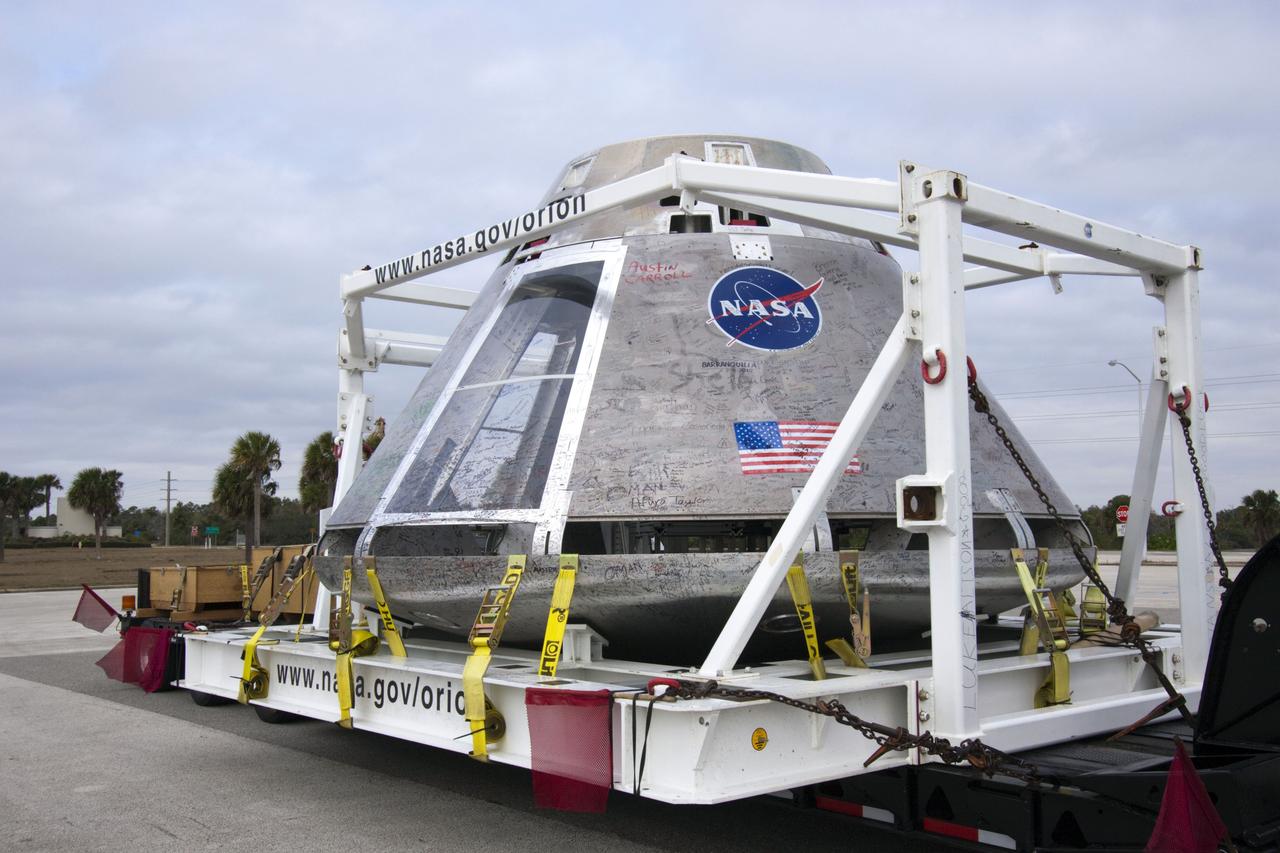 CAPE CANAVERAL, Fla. – A test version of NASA’s Orion spacecraft completed a cross-country journey at NASA’s Kennedy Space Center in Florida on Feb. 8, after giving residents in three states the chance to see a full scale mockup of the craft that will take humans into deep space. The capsule will be stored in Kennedy’s Multi-Payload Processing Facility.      The test vehicle was used by ground crews in advance of the launch abort system flight test that took place in New Mexico in 2010. Photo Credit: NASA/Jim Grossmann