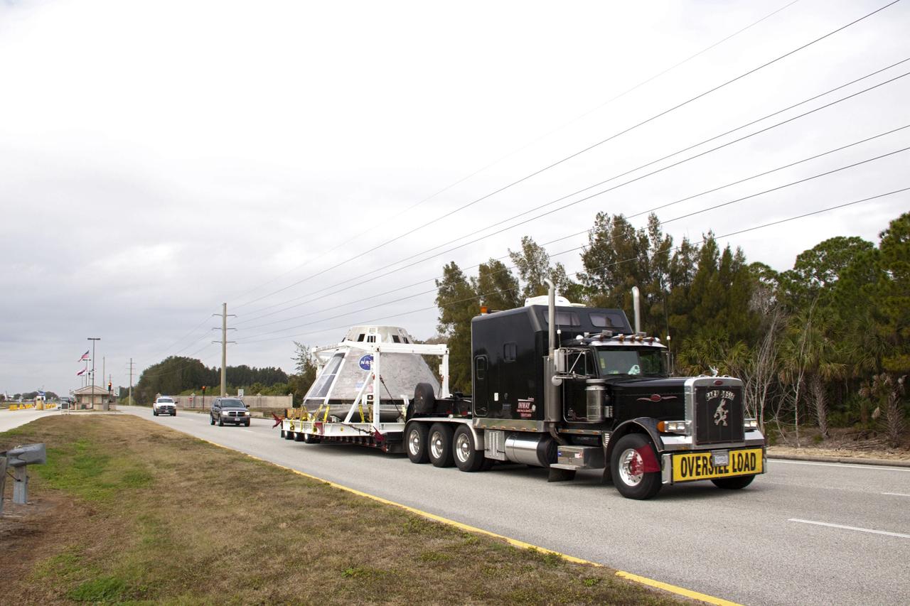 CAPE CANAVERAL, Fla. – A test version of NASA’s Orion spacecraft completed a cross-country journey at NASA’s Kennedy Space Center in Florida on Feb. 8, after giving residents in three states the chance to see a full scale mockup of the craft that will take humans into deep space. The capsule will be stored in Kennedy’s Multi-Payload Processing Facility.      The test vehicle was used by ground crews in advance of the launch abort system flight test that took place in New Mexico in 2010. Photo Credit: NASA/Jim Grossmann