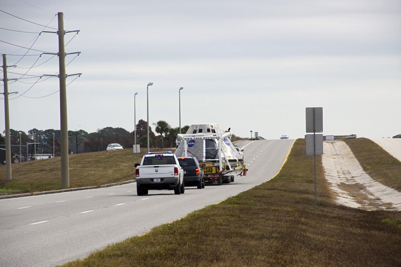 CAPE CANAVERAL, Fla. – A test version of NASA’s Orion spacecraft completed a cross-country journey at NASA’s Kennedy Space Center in Florida on Feb. 8, after giving residents in three states the chance to see a full scale mockup of the craft that will take humans into deep space. The capsule will be stored in Kennedy’s Multi-Payload Processing Facility.      The test vehicle was used by ground crews in advance of the launch abort system flight test that took place in New Mexico in 2010. Photo Credit: NASA/Jim Grossmann