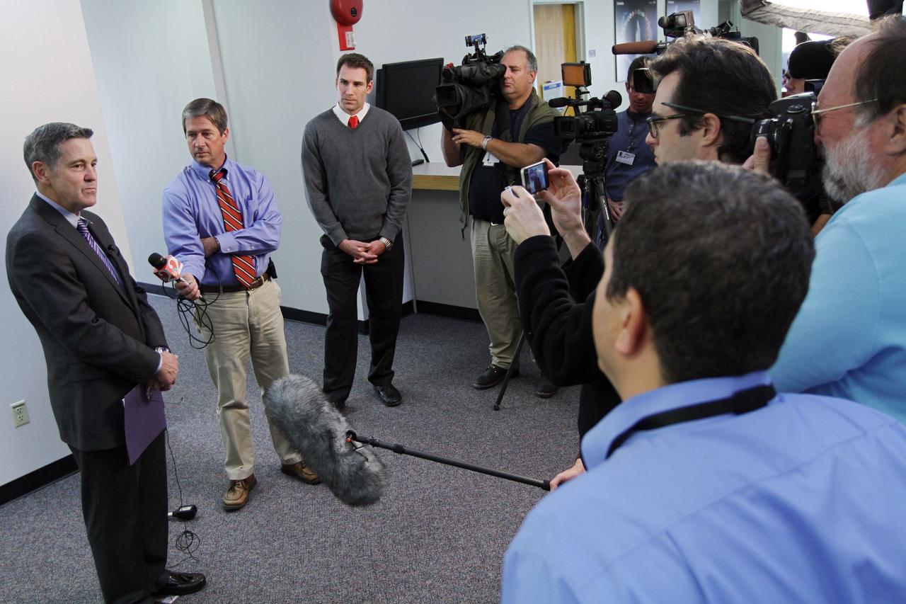 CAPE CANAVERAL, Fla. -- Bob Cabana, director of NASA's Kennedy Space Center in Florida, left, discusses the fiscal year 2013 budget proposal for the space agency, which was released today, with members of the news media at the NASA News Center at Kennedy. Cabana is a former space shuttle astronaut who became the Kennedy director in October 2008. Photo credit: NASA/ Kim Shiflett