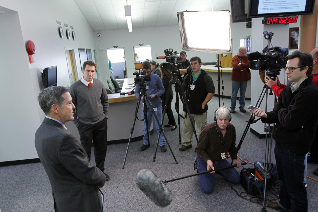 CAPE CANAVERAL, Fla. -- Bob Cabana, director of NASA's Kennedy Space Center in Florida, left, discusses the fiscal year 2013 budget proposal for the space agency, which was released today, with members of the news media at the NASA News Center at Kennedy. Cabana is a former space shuttle astronaut who became the Kennedy director in October 2008. Photo credit: NASA/ Kim Shiflett