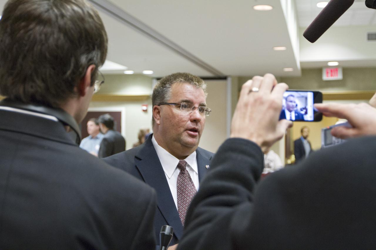 COCOA BEACH, Fla. -- Ed Mango, program manager for NASA's Commercial Crew Program CCP, talks to media during a preproposal conference at the Courtyard Marriott in Cocoa Beach, Fla. The meeting focused on information related to NASA's release of the Commercial Crew Integrated Capability CCiCap Announcement for Proposals on Feb. 7. More than 50 industry partners and stakeholders from 25 aerospace companies attended the conference to find out what the space agency would be looking for in terms of milestones, funding, schedules, strategies, safety cultures, business modules and eventual flight certification standards of integrated crew space transportation systems.        The goal of the CCiCap is to develop an indigenous U.S. transportation system that can safely, affordably and routinely fly to low Earth orbit destinations, including the International Space Station. Proposals are due March 23 and NASA plans to award multiple Space Act Agreements, valued from $300 million to $500 million each, toward the development of fully integrated commercial crew transportation systems in the summer of 2012.  For more information, visit www.nasa.gov/commercialcrew   Photo credit: Kim Shiflett
