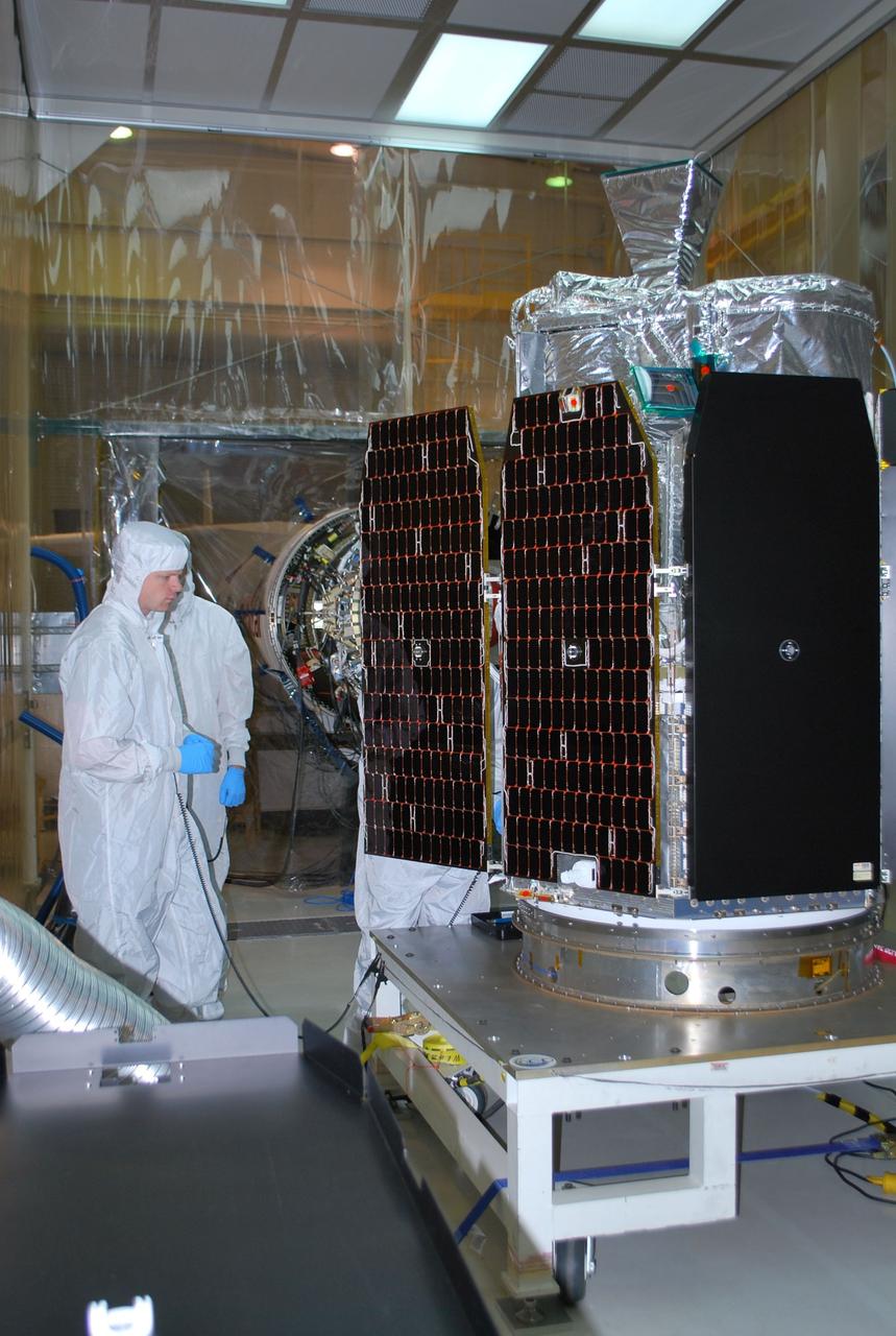 VANDENBERG AIR FORCE BASE, Calif. -- At Vandenberg Air Force Base's processing facility in California, NASA’s NuSTAR spacecraft undergoes a solar array deployment test. The Pegasus will launch NASA's Nuclear Spectroscopic Telescope Array NuSTAR into space. After the rocket and spacecraft are processed at Vandenberg, they will be flown on the Orbital Sciences’ L-1011 carrier aircraft to the Ronald Reagan Ballistic Missile Defense Test Site at the Pacific Ocean’s Kwajalein Atoll for launch. The high-energy x-ray telescope will conduct a census for black holes, map radioactive material in young supernovae remnants, and study the origins of cosmic rays and the extreme physics around collapsed stars. For more information, visit science.nasa.gov/missions/nustar/. Photo credit: NASA/Randy Beaudoin, VAFB