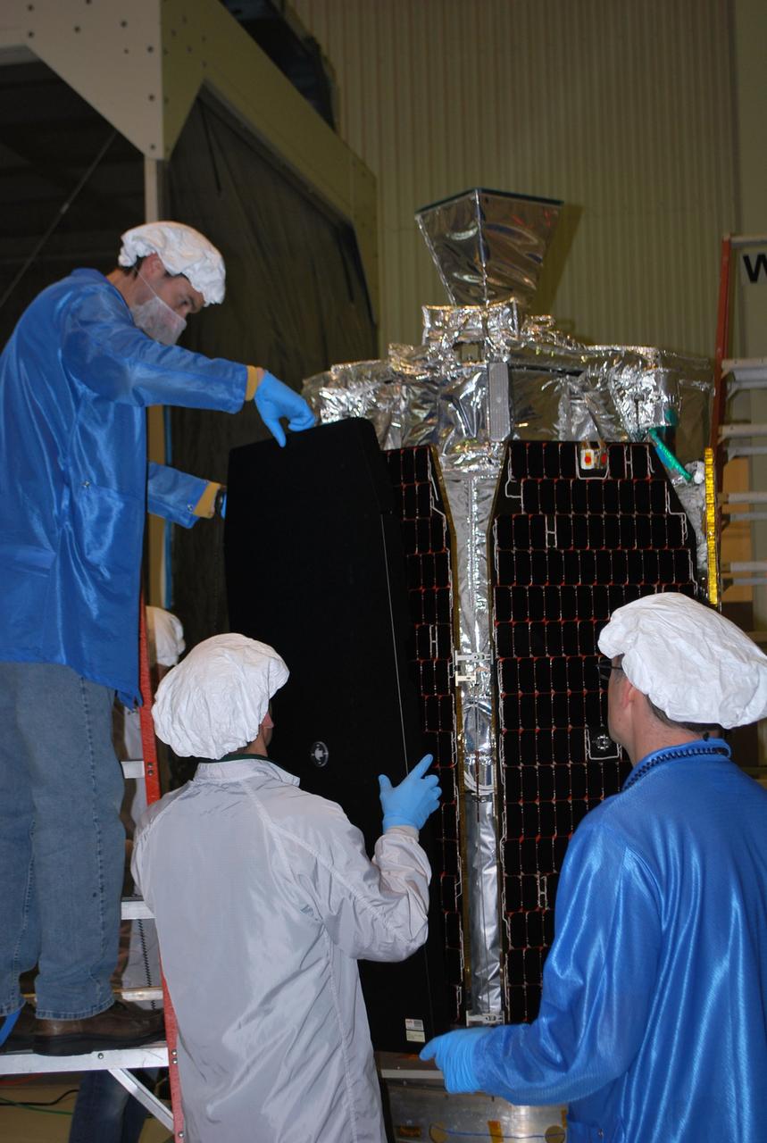 VANDENBERG AIR FORCE BASE, Calif. -- At Vandenberg Air Force Base's processing facility in California, technicians prepare NASA’s NuSTAR spacecraft to be lifted into a tilt-rotation fixture. The spacecraft will be rotated to horizontal for joining with the Pegasus XL rocket. The Orbital Sciences Pegasus will launch NASA's Nuclear Spectroscopic Telescope Array NuSTAR into space. After the rocket and spacecraft are processed at Vandenberg, they will be flown on Orbital's L-1011 carrier aircraft to the Ronald Reagan Ballistic Missile Defense Test Site at the Pacific Ocean’s Kwajalein Atoll for launch. The high-energy x-ray telescope will conduct a census for black holes, map radioactive material in young supernovae remnants, and study the origins of cosmic rays and the extreme physics around collapsed stars. For more information, visit science.nasa.gov/missions/nustar/. Photo credit: NASA/Randy Beaudoin, VAFB