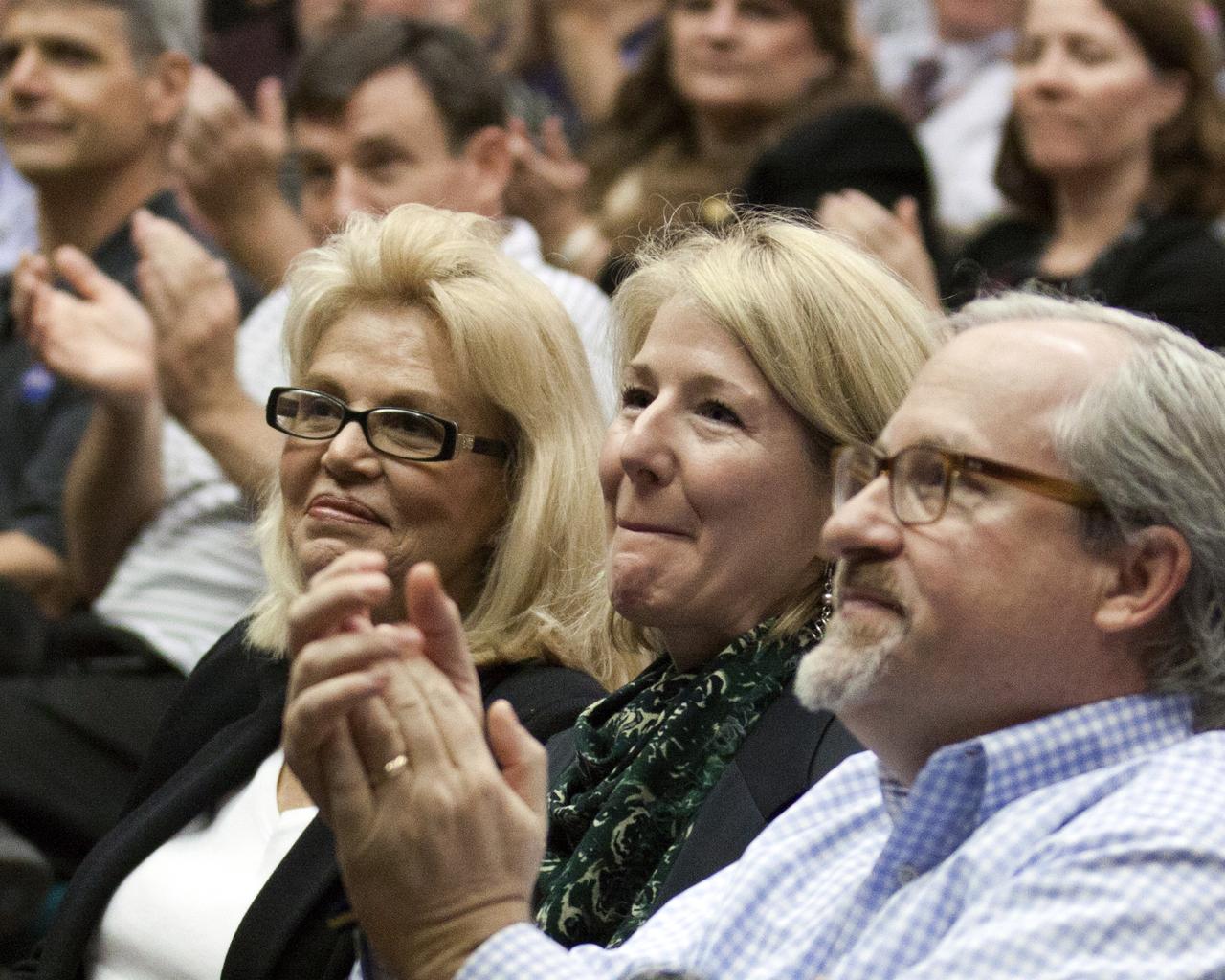 CAPE CANAVERAL, Fla. -- Mercury astronaut Scott Carpenter's wife, Patricia Carpenter, left, and children listen during the "50 Years of Americans in Orbit" presentation for employees at NASA's Kennedy Space Center in Florida. John Glenn and fellow Mercury astronaut Scott Carpenter were joined by NASA Administrator Charles Bolden and Center Director Bob Cabana on stage in Kennedy's training auditorium.      This year marks 50 years since Glenn and Carpenter became the first two Americans to orbit Earth. Photo credit: NASA/Kim Shiflett