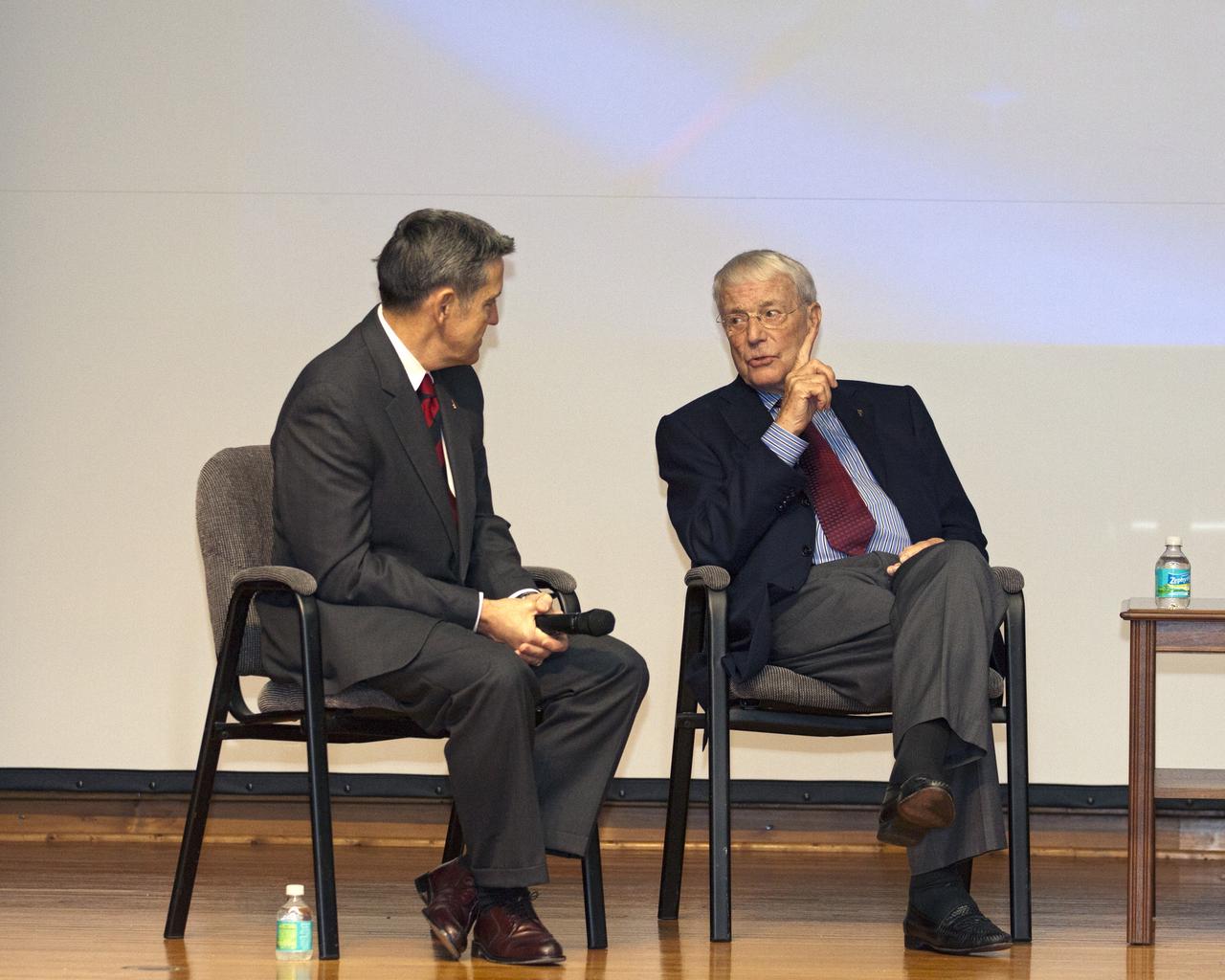CAPE CANAVERAL, Fla. -- Mercury astronaut Scott Carpenter talks to Bob Cabana, director of NASA's Kennedy Space Center in Florida, during the "50 Years of Americans in Orbit" presentation for employees at NASA's Kennedy Space Center in Florida. Mercury astronaut John Glenn and NASA Administrator Charles Bolden joined Carpenter and Cabana for the event.     This year marks 50 years since Glenn and Carpenter became the first two Americans to orbit Earth. Photo credit: NASA/Kim Shiflett