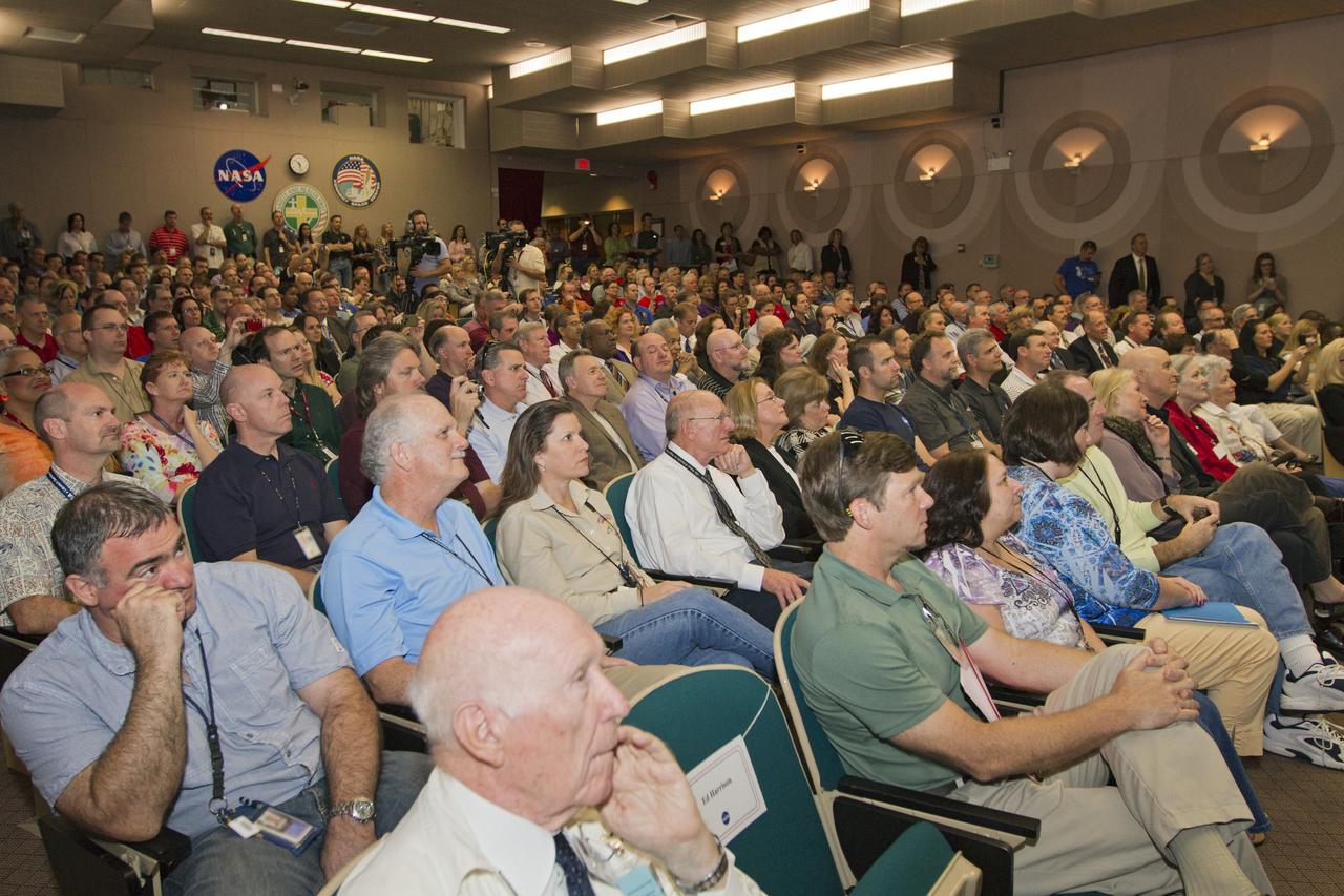 CAPE CANAVERAL, Fla. -- It's "standing room only" in the training auditorium at NASA's Kennedy Space Center in Florida, where Mercury astronauts John Glenn and Scott Carpenter were joined by NASA Administrator Charles Bolden and Center Director Bob Cabana for the "50 Years of Americans in Orbit" presentation for employees.     This year marks 50 years since Glenn and Carpenter became the first two Americans to orbit Earth. Photo credit: NASA/Kim Shiflett