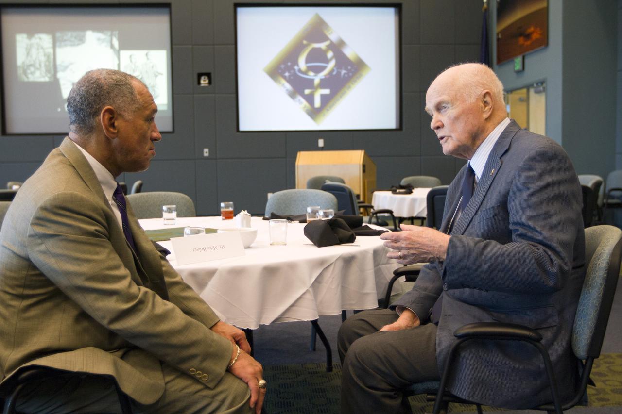 CAPE CANAVERAL, Fla. -NASA Administrator Charles Bolden, left, talks with astronaut John Glenn following a luncheon Feb. 17, 2012, celebrating 50 years of Americans in orbit, an era which began with Glenn's Mercury mission MA-6, on Feb. 20, 1962.  Glenn's launch aboard an Atlas rocket took with it the hopes of an entire nation and ushered in a new era of space travel that eventually led to Americans walking on the moon by the end of the 1960s. Glenn soon was followed into orbit by Scott Carpenter, Walter Schirra and Gordon Cooper. Their fellow Mercury astronauts Alan Shepard and Virgil "Gus" Grissom flew earlier suborbital flights. Deke Slayton, a member of NASA's original Mercury 7 astronauts, was grounded by a medical condition until the Apollo-Soyuz Test Project in 1975. Photo credit: NASA/Kim Shiflett