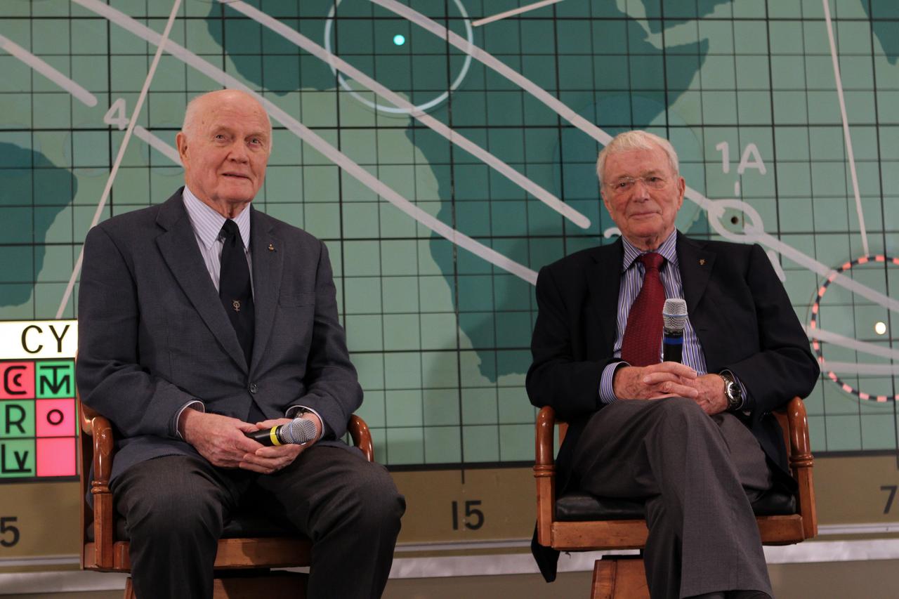 CAPE CANAVERAL, Fla. --Mercury astronauts John Glenn, left, and Scott Carpenter sit in front of the plot board from the Mercury control center on display at the Kennedy Space Center Visitor Complex in Florida. The astronaut, part of the original class of seven astronauts chosen by NASA, was taking part in a question-and-answer session with the media as part of events celebrating 50 years of Americans in orbit, an era which began with John Glenn's Mercury mission MA-6, on Feb. 20, 1962.  Glenn's launch aboard an Atlas rocket took with it the hopes of an entire nation and ushered in a new era of space travel that eventually led to Americans walking on the moon by the end of the 1960s. Glenn soon was followed into orbit by Carpenter, Walter Schirra and Gordon Cooper. Their fellow Mercury astronauts Alan Shepard and Virgil "Gus" Grissom flew earlier suborbital flights. Deke Slayton was grounded by a medical condition until the Apollo-Soyuz Test Project in 1975. Photo credit: NASA/Kim Shiflett