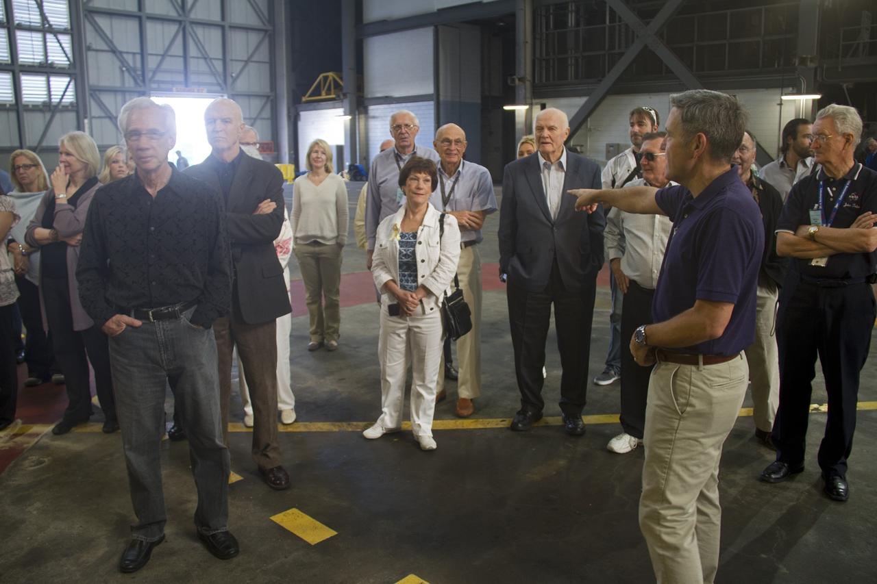 CAPE CANAVERAL, Fla. -- NASA Kennedy Space Center Bob Cabana talks to guests about the Mercury Project's Atlas rocket in the Vehicle Assembly Building. At the space center in Florida, Cabana is helping John Glenn mark the 50th anniversary of being the first American astronaut to orbit the Earth inside the NASA Mercury Project's Friendship 7 capsule on Feb. 20, 1962. Glenn later returned to space in October 1998 as a payload specialist aboard space shuttle Discovery's STS-95 mission.         Glenn's launch aboard an Atlas rocket took with it the hopes of an entire nation and ushered in a new era of space travel that eventually led to Americans walking on the moon by the end of the 1960s. Glenn soon was followed into orbit by Scott Carpenter, Walter Schirra and Gordon Cooper. Their fellow Mercury astronauts Alan Shepard and Virgil "Gus" Grissom flew earlier suborbital flights. Deke Slayton, a member of NASA's original Mercury 7 astronauts, was grounded by a medical condition until the Apollo-Soyuz Test Project in 1975. Photo credit: Cory Huston
