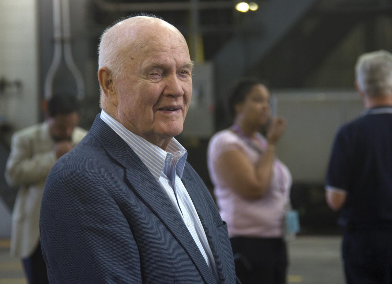 CAPE CANAVERAL, Fla. -- John Glenn tours the Vehicle Assembly Building at NASA's Kennedy Space Center in Florida. Glenn is at the space center to mark the 50th anniversary of being the first American astronaut to orbit the Earth inside the NASA Mercury Project's Friendship 7 capsule on Feb. 20, 1962. Glenn later returned to space in October 1998 as a payload specialist aboard space shuttle Discovery's STS-95 mission.       Glenn's launch aboard an Atlas rocket took with it the hopes of an entire nation and ushered in a new era of space travel that eventually led to Americans walking on the moon by the end of the 1960s. Glenn soon was followed into orbit by Scott Carpenter, Walter Schirra and Gordon Cooper. Their fellow Mercury astronauts Alan Shepard and Virgil "Gus" Grissom flew earlier suborbital flights. Deke Slayton, a member of NASA's original Mercury 7 astronauts, was grounded by a medical condition until the Apollo-Soyuz Test Project in 1975. Photo credit: Cory Huston