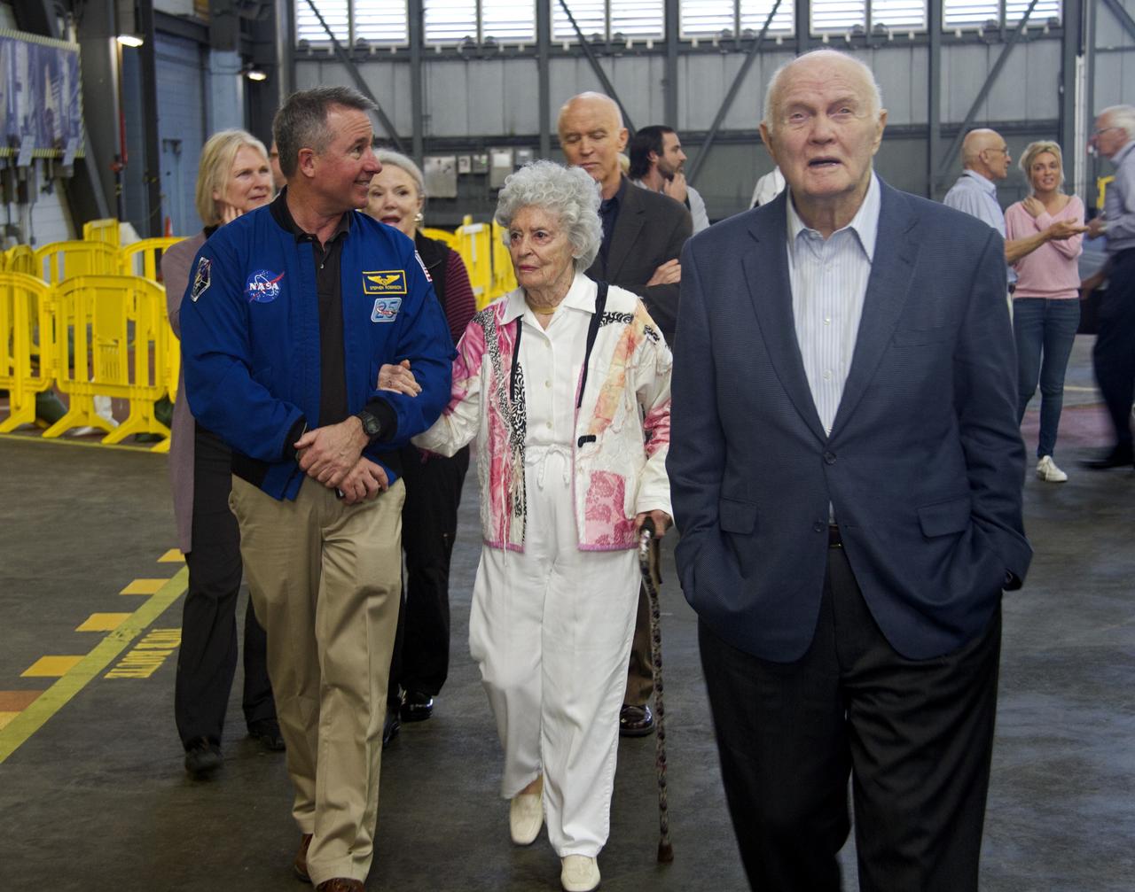 CAPE CANAVERAL, Fla. -- John Glenn and his wife, Annie, and NASA astronaut Stephen Robinson tour the Vehicle Assembly Building at NASA's Kennedy Space Center in Florida. Glenn is at the space center to mark the 50th anniversary of being the first American astronaut to orbit the Earth inside the NASA Mercury Project's Friendship 7 capsule on Feb. 20, 1962. Glenn later returned to space in October 1998 as a payload specialist aboard space shuttle Discovery's STS-95 mission. Robinson was the payload commander of STS-95.    Glenn's launch aboard an Atlas rocket took with it the hopes of an entire nation and ushered in a new era of space travel that eventually led to Americans walking on the moon by the end of the 1960s. Glenn soon was followed into orbit by Scott Carpenter, Walter Schirra and Gordon Cooper. Their fellow Mercury astronauts Alan Shepard and Virgil "Gus" Grissom flew earlier suborbital flights. Deke Slayton, a member of NASA's original Mercury 7 astronauts, was grounded by a medical condition until the Apollo-Soyuz Test Project in 1975. Photo credit: Cory Huston