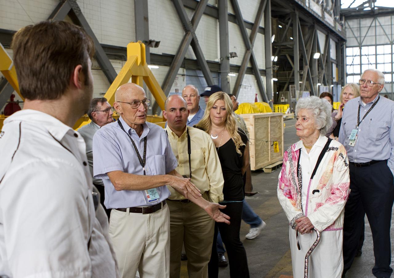 CAPE CANAVERAL, Fla. -- Former space shuttle launch director, Bob Sieck, talks to guests in the Vehicle Assembly Building at NASA's Kennedy Space Center in Florida. Sieck is helping John Glenn mark the 50th anniversary of being the first American astronaut to orbit the Earth inside the NASA Mercury Project's Friendship 7 capsule on Feb. 20, 1962. Glenn later returned to space in October 1998 as a payload specialist aboard space shuttle Discovery's STS-95 mission.     Glenn's launch aboard an Atlas rocket took with it the hopes of an entire nation and ushered in a new era of space travel that eventually led to Americans walking on the moon by the end of the 1960s. Glenn soon was followed into orbit by Scott Carpenter, Walter Schirra and Gordon Cooper. Their fellow Mercury astronauts Alan Shepard and Virgil "Gus" Grissom flew earlier suborbital flights. Deke Slayton, a member of NASA's original Mercury 7 astronauts, was grounded by a medical condition until the Apollo-Soyuz Test Project in 1975. Photo credit: Cory Huston