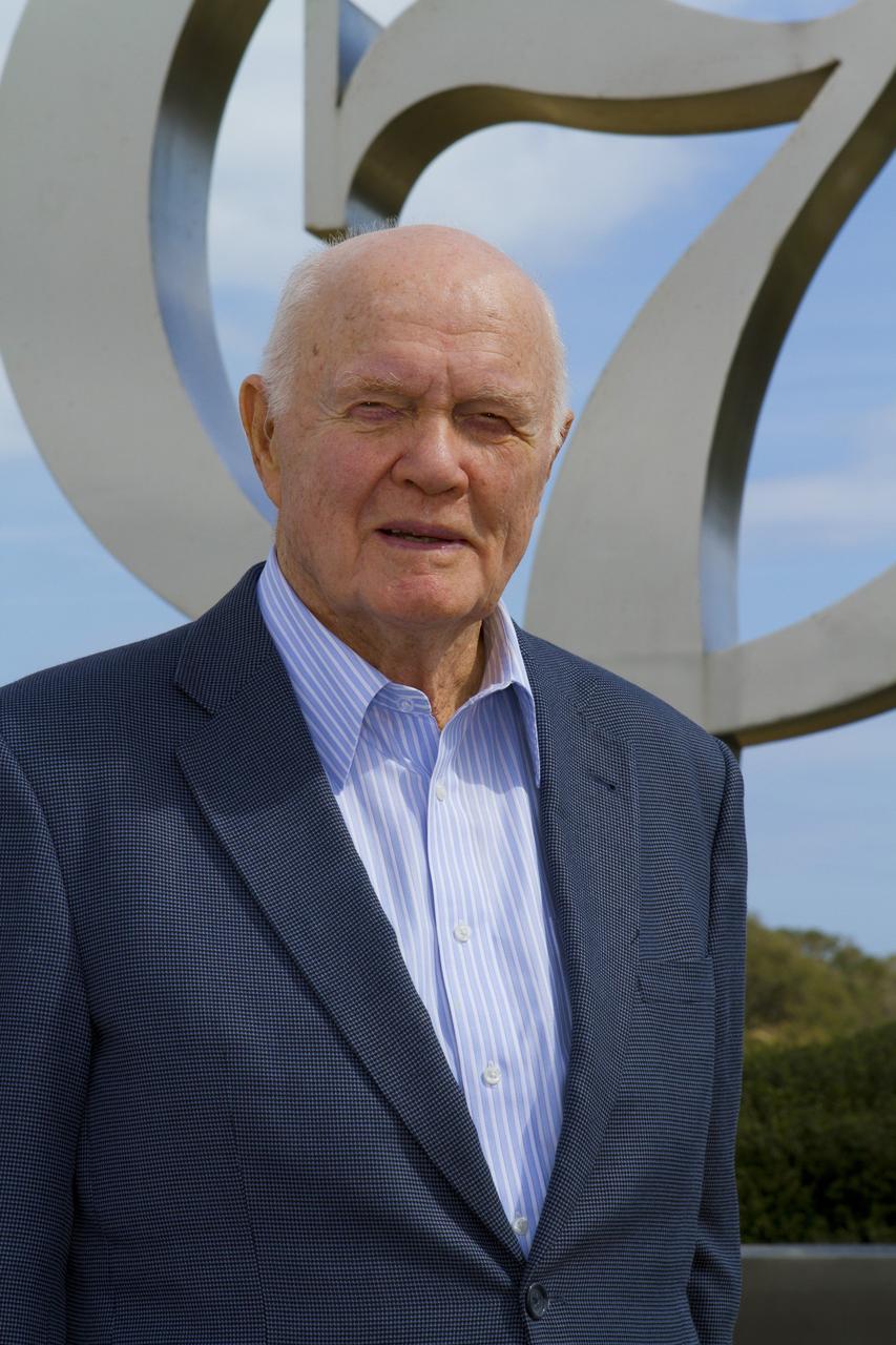 CAPE CANAVERAL, Fla. -- Mercury astronaut John Glenn poses for a photo in front of the Project Mercury monument at Launch Complex-14 LC-14 at Cape Canaveral Air Force Station in Florida. During events at the Cape and NASA's Kennedy Space Center, Glenn is marking the 50th anniversary of being the first American astronaut to orbit the Earth inside the Friendship 7 capsule on Feb. 20, 1962.     Glenn's launch aboard an Atlas rocket took with it the hopes of an entire nation and ushered in a new era of space travel that eventually led to Americans walking on the moon by the end of the 1960s. Glenn soon was followed into orbit by Scott Carpenter, Walter Schirra and Gordon Cooper. Their fellow Mercury astronauts Alan Shepard and Virgil "Gus" Grissom flew earlier suborbital flights. Deke Slayton, a member of NASA's original Mercury 7 astronauts, was grounded by a medical condition until the Apollo-Soyuz Test Project in 1975. Photo credit: Kim Shiflett