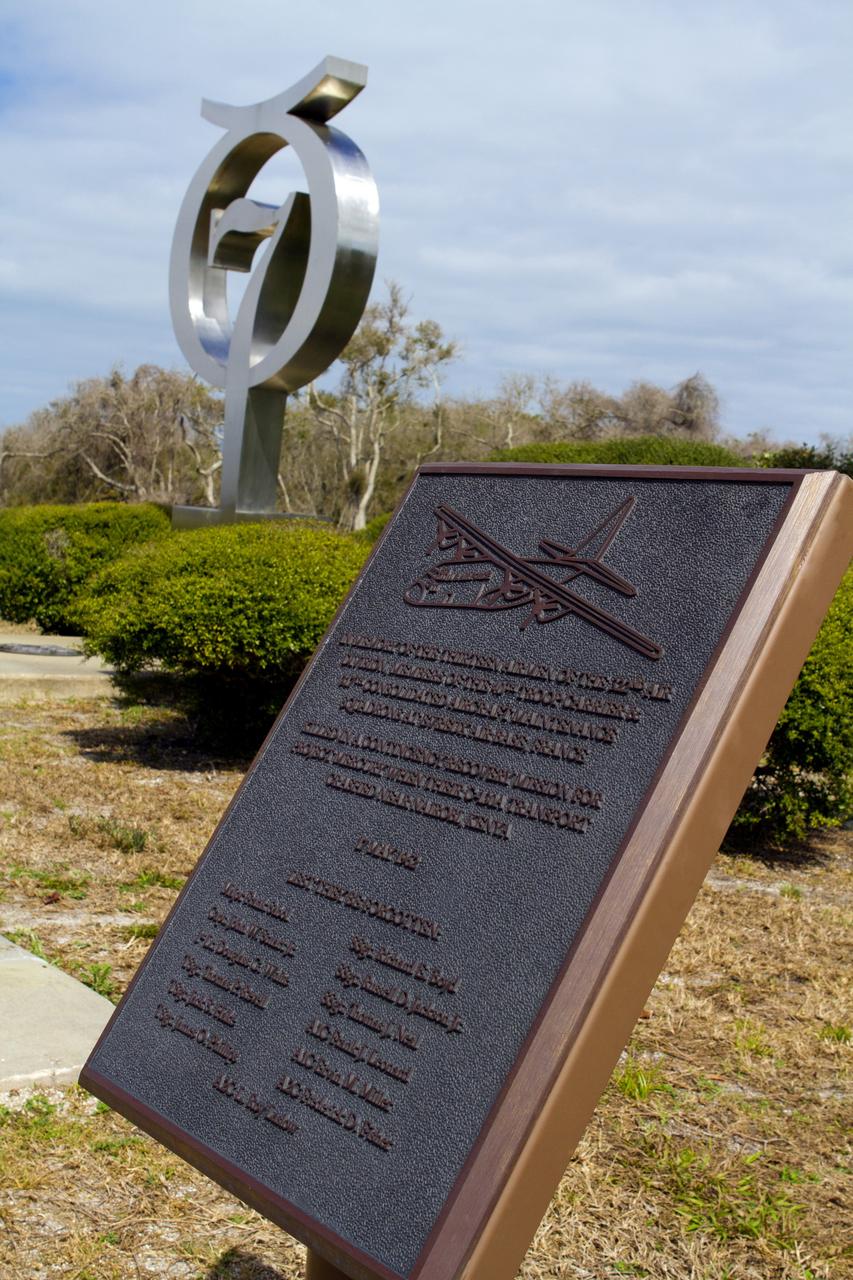 CAPE CANAVERAL, Fla. -- At Launch Complex-14 LC-14 at Cape Canaveral Air Force Station in Florida, a memorial honors the 13 crew members of the U.S. Air Force's 32nd Air Division, 40th Troop Carrier and 317th Consolidated Aircraft Maintenance Squadron, who were killed in a C-130A transport plane crash near Nairobi, Kenya, during a contingency mission for NASA's Project Mercury in 1962. The crash happened 50 years ago, after John Glenn's orbital flight on Feb. 20, 1962, and before Scott Carpenter's on May 24, 1962. Glenn and Carpenter participated in 50th anniversary commemorative events at the Cape and NASA's Kennedy Space Center and stopped by the memorial to honor the Airmen who made the ultimate sacrifice making a distinctive service to their country.