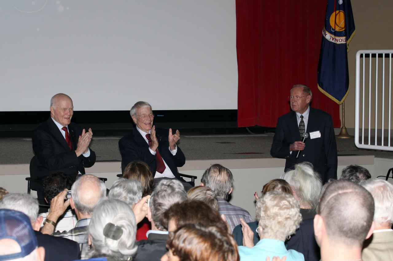 CAPE CANAVERAL, Fla. -- Mercury astronauts, John Glenn, left, and Scott Carpenter, talk to Mercury Project workers and other guests in the Astronaut Encounter Theater at the Kennedy Space Center Visitor Complex in Florida. The pair participated in 50th anniversary events at the launch site of Glenn's first orbital flight aboard NASA's Friendship 7 capsule, which launched Feb. 20, 1962, aboard an Atlas rocket. At right, is Jack King, who was chief of Kennedy's Public Information Office during Project Mercury.            Glenn's launch aboard an Atlas rocket took with it the hopes of an entire nation and ushered in a new era of space travel that eventually led to Americans walking on the moon by the end of the 1960s. Glenn soon was followed into orbit by Carpenter, Walter Schirra and Gordon Cooper. Their fellow Mercury astronauts Alan Shepard and Virgil "Gus" Grissom flew earlier suborbital flights. Deke Slayton, a member of NASA's original Mercury 7 astronauts, was grounded by a medical condition until the Apollo-Soyuz Test Project in 1975. Photo credit: Kim Shiflett