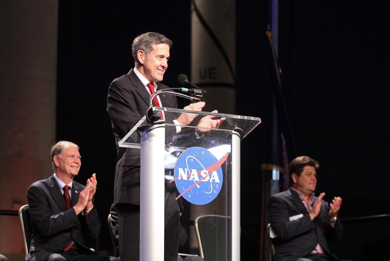 CAPE CANAVERAL, Fla. --Kennedy Space Center Director Bob Cabana makes remarks during the "On Shoulders of Giants" program celebrating 50 years of Americans in orbit, an era which began with John Glenn's MA-6 mission on Feb. 20, 1962. Looking on are U.S. Rep. Bill Posey, left, and event MC John Zarella. The event was conducted in the Rocket Garden at the Kennedy Space Center Visitor Complex in Florida a few miles from the launch pad where Glenn and Scott Carpenter took flight in Mercury spacecraft.  Glenn's launch aboard an Atlas rocket took with it the hopes of an entire nation and ushered in a new era of space travel that eventually led to Americans walking on the moon by the end of the 1960s. Glenn soon was followed into orbit by Scott Carpenter, Walter Schirra and Gordon Cooper. Their fellow Mercury astronauts Alan Shepard and Virgil "Gus" Grissom flew earlier suborbital flights. Deke Slayton, a member of NASA's original Mercury 7 astronauts, was grounded by a medical condition until the Apollo-Soyuz Test Project in 1975. Photo credit: Kim Shiflett