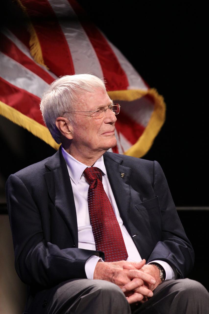 CAPE CANAVERAL, Fla. -- Mercury astronaut Scott Carpenter listens to remarks during the "On Shoulders of Giants" program celebrating 50 years of Americans in orbit, an era which began with John Glenn's MA-6 mission on Feb. 20, 1962. The event was conducted in the Rocket Garden at the Kennedy Space Center Visitor Complex in Florida a few miles from the launch pad where Glenn and Scott Carpenter took flight in Mercury spacecraft.  Glenn's launch aboard an Atlas rocket took with it the hopes of an entire nation and ushered in a new era of space travel that eventually led to Americans walking on the moon by the end of the 1960s. Glenn soon was followed into orbit by Scott Carpenter, Walter Schirra and Gordon Cooper. Their fellow Mercury astronauts Alan Shepard and Virgil "Gus" Grissom flew earlier suborbital flights. Deke Slayton, a member of NASA's original Mercury 7 astronauts, was grounded by a medical condition until the Apollo-Soyuz Test Project in 1975. Photo credit: Kim Shiflett