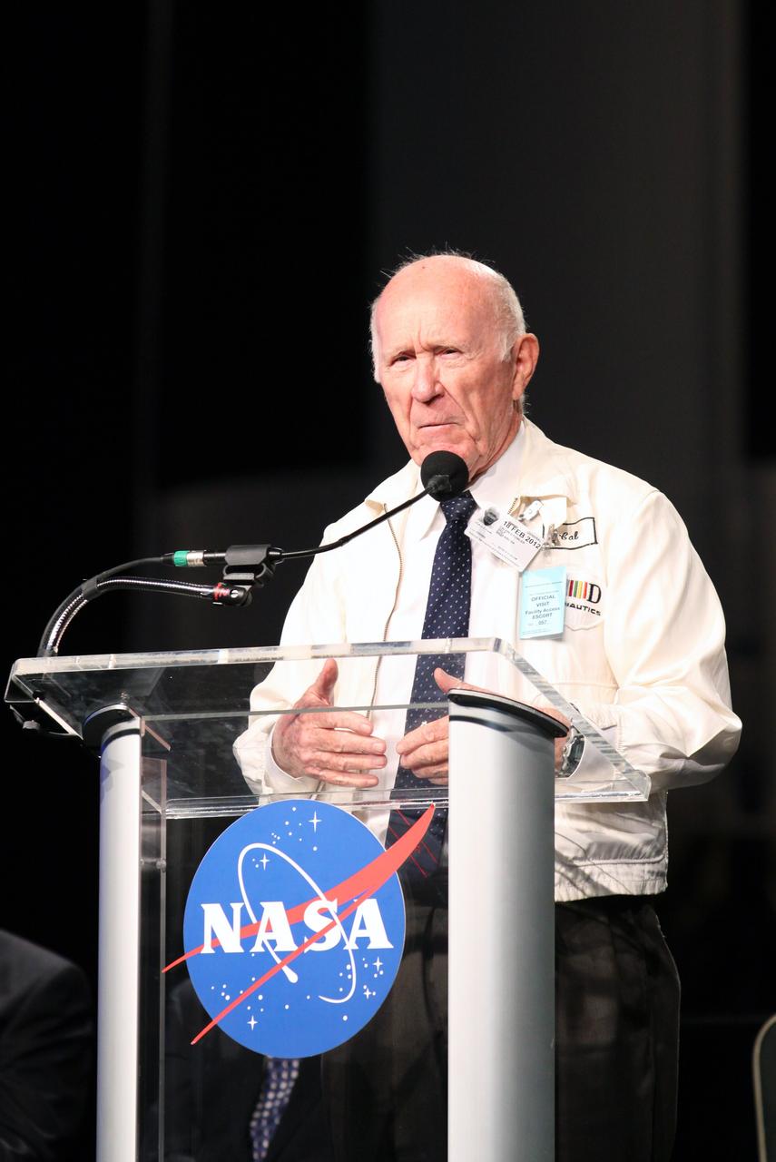 CAPE CANAVERAL, Fla. -- Cal Fowler, Launch test director during Mercury, speaks during the "On Shoulders of Giants" program celebrating 50 years of Americans in orbit, an era which began with John Glenn's MA-6 mission on Feb. 20, 1962. The event was conducted in the Rocket Garden at the Kennedy Space Center Visitor Complex in Florida a few miles from the launch pad where Glenn and Scott Carpenter took flight in Mercury spacecraft.  Glenn's launch aboard an Atlas rocket took with it the hopes of an entire nation and ushered in a new era of space travel that eventually led to Americans walking on the moon by the end of the 1960s. Glenn soon was followed into orbit by Carpenter, Walter Schirra and Gordon Cooper. Their fellow Mercury astronauts Alan Shepard and Virgil "Gus" Grissom flew earlier suborbital flights. Deke Slayton, a member of NASA's original Mercury 7 astronauts, was grounded by a medical condition until the Apollo-Soyuz Test Project in 1975. Photo credit: Kim Shiflett