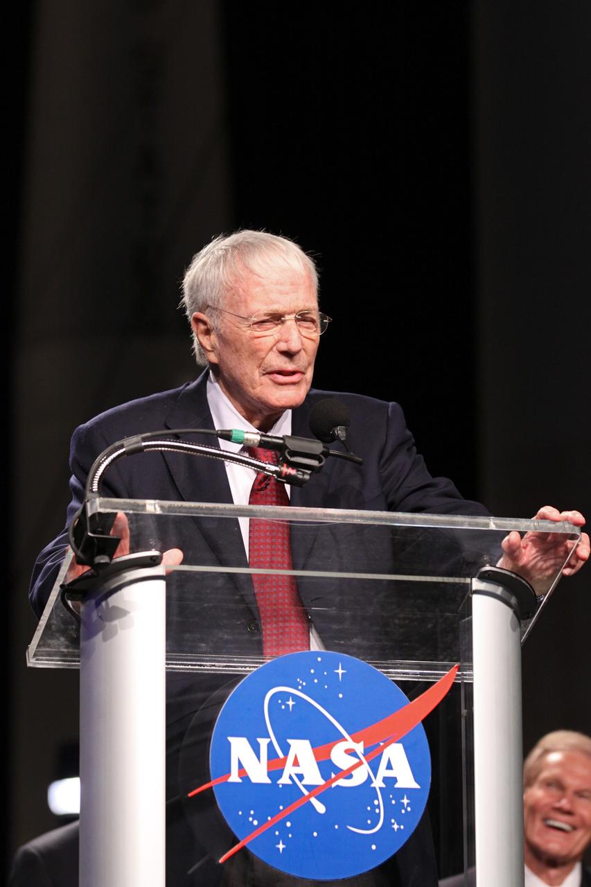 CAPE CANAVERAL, Fla. -- Mercury astronaut Scott Carpenter speaks during the "On Shoulders of Giants" program celebrating 50 years of Americans in orbit, an era which began with John Glenn's MA-6 mission on Feb. 20, 1962. The event was conducted in the Rocket Garden at the Kennedy Space Center Visitor Complex in Florida a few miles from the launch pad where Glenn and Scott Carpenter took flight in Mercury spacecraft.  Glenn's launch aboard an Atlas rocket took with it the hopes of an entire nation and ushered in a new era of space travel that eventually led to Americans walking on the moon by the end of the 1960s. Glenn soon was followed into orbit by Scott Carpenter, Walter Schirra and Gordon Cooper. Their fellow Mercury astronauts Alan Shepard and Virgil "Gus" Grissom flew earlier suborbital flights. Deke Slayton, a member of NASA's original Mercury 7 astronauts, was grounded by a medical condition until the Apollo-Soyuz Test Project in 1975. Photo credit: Kim Shiflett
