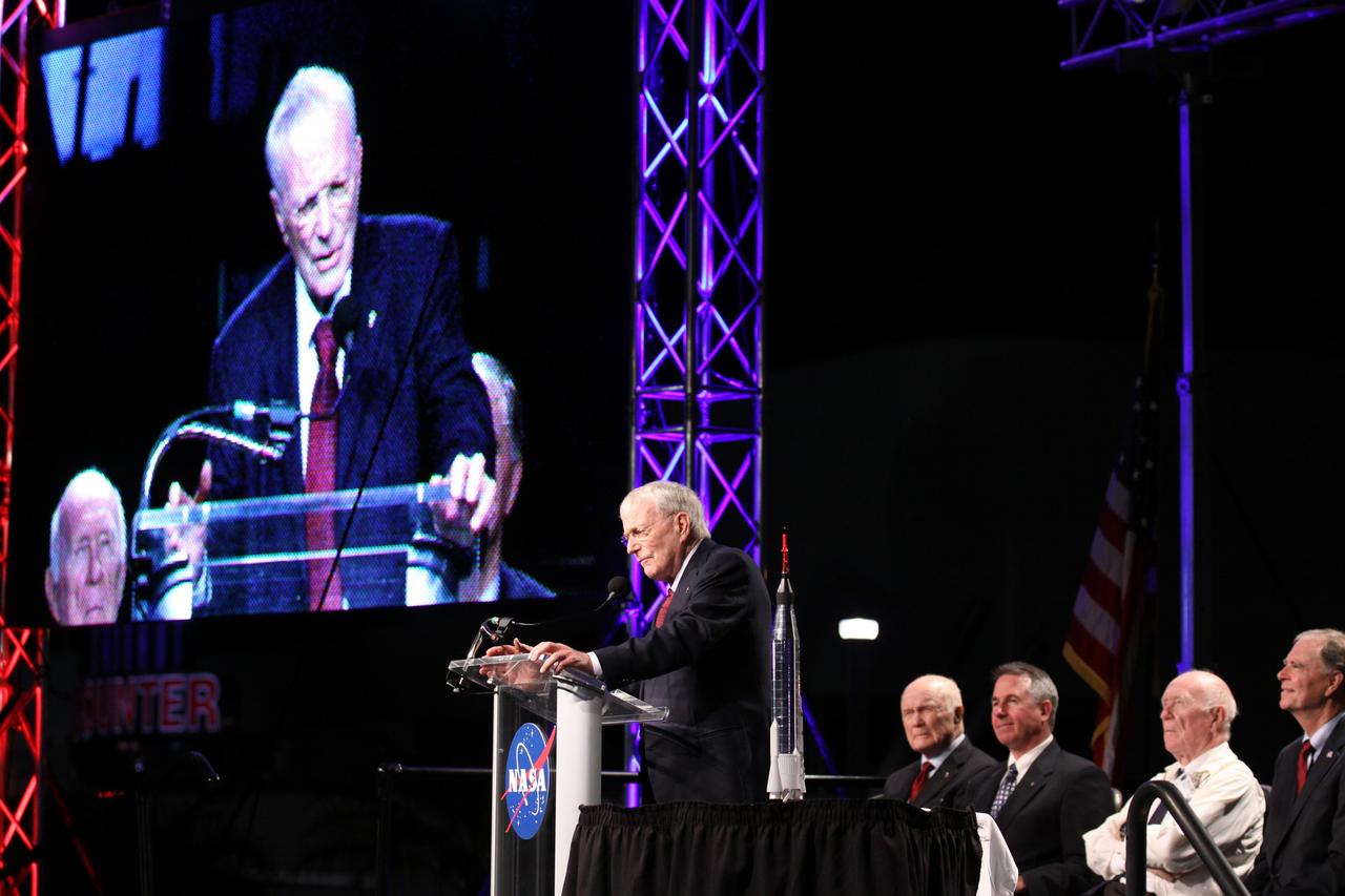 CAPE CANAVERAL, Fla. -- Mercury astronaut Scott Carpenter speaks during the "On Shoulders of Giants" program celebrating 50 years of Americans in orbit, an era which began with John Glenn's MA-6 mission on Feb. 20, 1962. The event was conducted in the Rocket Garden at the Kennedy Space Center Visitor Complex in Florida a few miles from the launch pad where Glenn and Scott Carpenter took flight in Mercury spacecraft.  Glenn's launch aboard an Atlas rocket took with it the hopes of an entire nation and ushered in a new era of space travel that eventually led to Americans walking on the moon by the end of the 1960s. Glenn soon was followed into orbit by Scott Carpenter, Walter Schirra and Gordon Cooper. Their fellow Mercury astronauts Alan Shepard and Virgil "Gus" Grissom flew earlier suborbital flights. Deke Slayton, a member of NASA's original Mercury 7 astronauts, was grounded by a medical condition until the Apollo-Soyuz Test Project in 1975. Photo credit: Kim Shiflett
