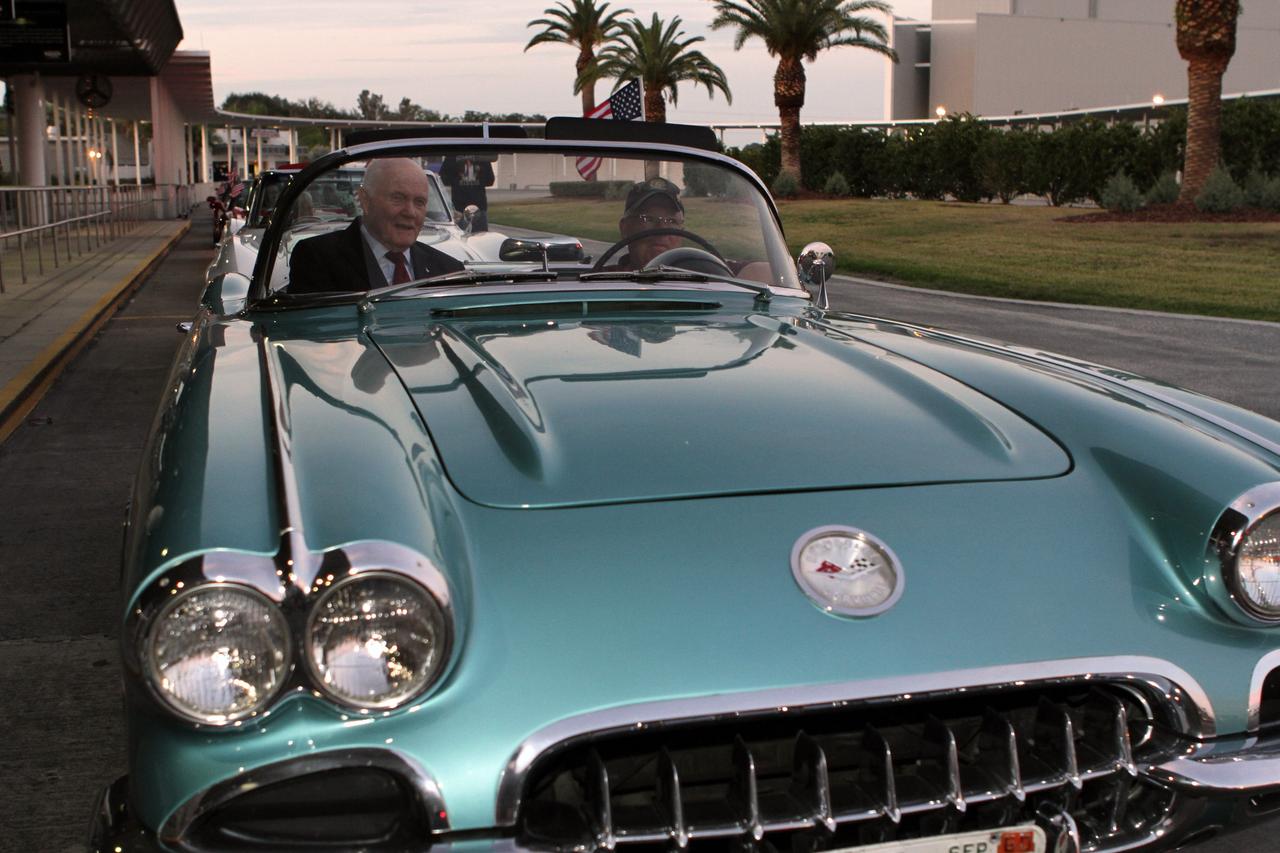 CAPE CANAVERAL, Fla. -- Mercury astronaut John Glenn, left, prepares to ride in the Corvette parade following the "On Shoulders of Giants" program celebrating 50 years of Americans in orbit, an era which began with Glenn's MA-6 mission on Feb. 20, 1962. The event was conducted in the Rocket Garden at the Kennedy Space Center Visitor Complex in Florida a few miles from the launch pad where Glenn and Scott Carpenter took flight in Mercury spacecraft.  Glenn's launch aboard an Atlas rocket took with it the hopes of an entire nation and ushered in a new era of space travel that eventually led to Americans walking on the moon by the end of the 1960s. Glenn soon was followed into orbit by Scott Carpenter, Walter Schirra and Gordon Cooper. Their fellow Mercury astronauts Alan Shepard and Virgil "Gus" Grissom flew earlier suborbital flights. Deke Slayton, a member of NASA's original Mercury 7 astronauts, was grounded by a medical condition until the Apollo-Soyuz Test Project in 1975. Photo credit: Kim Shiflett