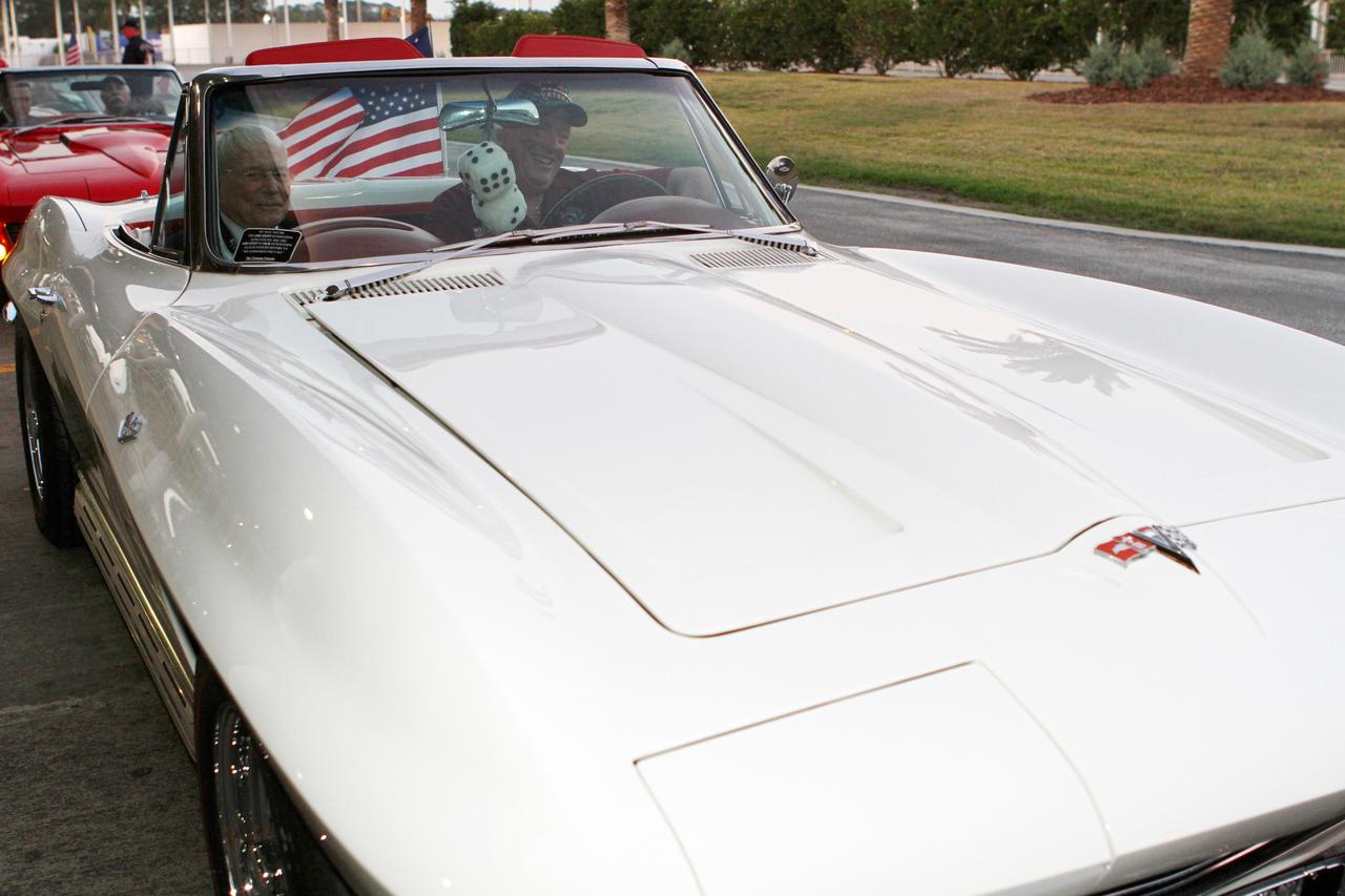 CAPE CANAVERAL, Fla. -- Mercury astronaut Scott Carpenter, left, prepares to ride in the Corvette parade following the "On Shoulders of Giants" program celebrating 50 years of Americans in orbit, an era which began with Glenn's MA-6 mission on Feb. 20, 1962. The event was conducted in the Rocket Garden at the Kennedy Space Center Visitor Complex in Florida a few miles from the launch pad where Glenn and Carpenter took flight in Mercury spacecraft.  Glenn's launch aboard an Atlas rocket took with it the hopes of an entire nation and ushered in a new era of space travel that eventually led to Americans walking on the moon by the end of the 1960s. Glenn soon was followed into orbit by Scott Carpenter, Walter Schirra and Gordon Cooper. Their fellow Mercury astronauts Alan Shepard and Virgil "Gus" Grissom flew earlier suborbital flights. Deke Slayton, a member of NASA's original Mercury 7 astronauts, was grounded by a medical condition until the Apollo-Soyuz Test Project in 1975. Photo credit: Kim Shiflett