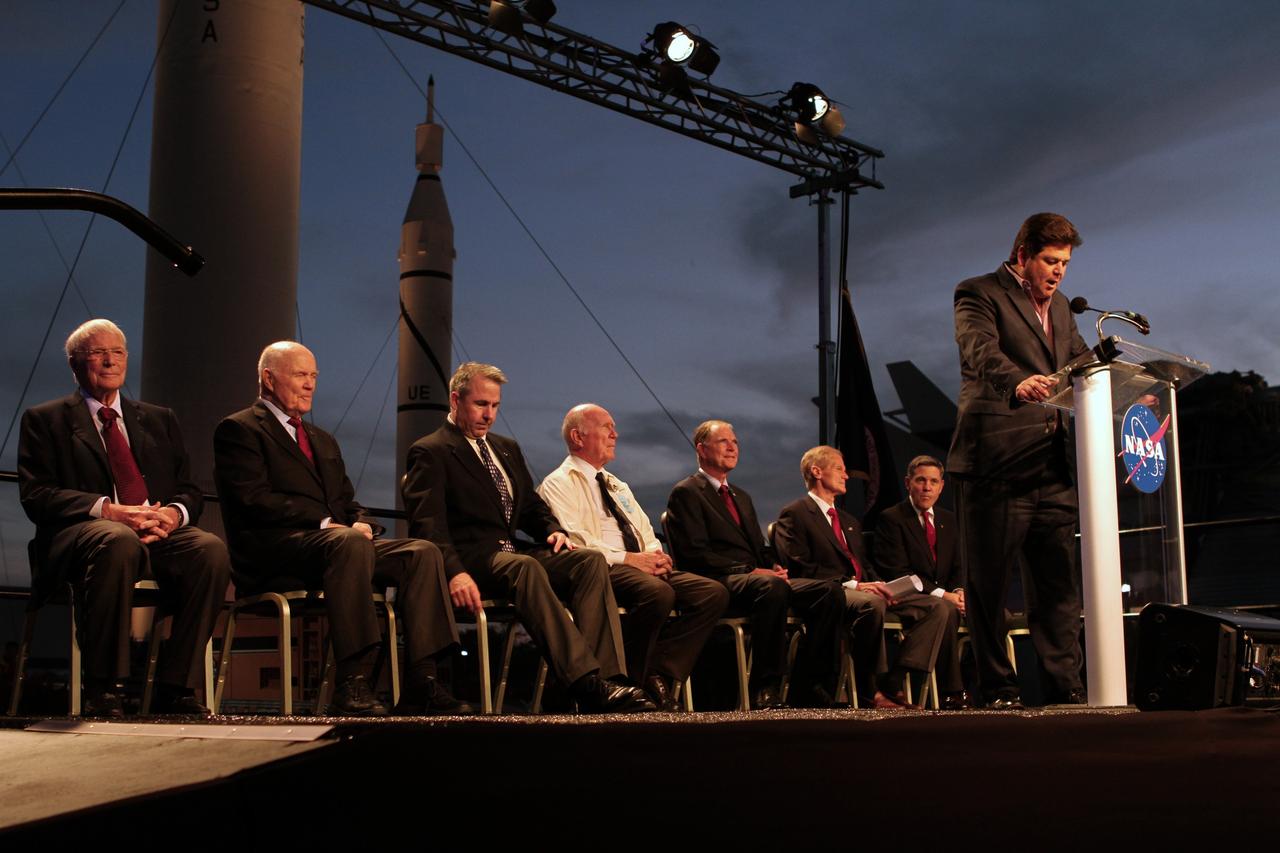 CAPE CANAVERAL, Fla. -- John Zarella makes remarks during the "On Shoulders of Giants" program celebrating 50 years of Americans in orbit, an era which began with John Glenn's MA-6 mission on Feb. 20, 1962. The event was conducted in the Rocket Garden at the Kennedy Space Center Visitor Complex in Florida a few miles from the launch pad where Glenn and Scott Carpenter took flight in Mercury spacecraft.  Glenn's launch aboard an Atlas rocket took with it the hopes of an entire nation and ushered in a new era of space travel that eventually led to Americans walking on the moon by the end of the 1960s. Glenn soon was followed into orbit by Scott Carpenter, Walter Schirra and Gordon Cooper. Their fellow Mercury astronauts Alan Shepard and Virgil "Gus" Grissom flew earlier suborbital flights. Deke Slayton, a member of NASA's original Mercury 7 astronauts, was grounded by a medical condition until the Apollo-Soyuz Test Project in 1975. Photo credit: Kim Shiflett