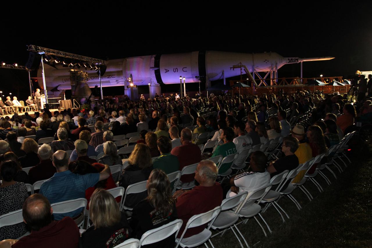 CAPE CANAVERAL, Fla. -- A crowd looks on during the "On Shoulders of Giants" program celebrating 50 years of Americans in orbit, an era which began with John Glenn's MA-6 mission on Feb. 20, 1962. The event was conducted in the Rocket Garden at the Kennedy Space Center Visitor Complex in Florida a few miles from the launch pad where Glenn and Scott Carpenter took flight in Mercury spacecraft.  Glenn's launch aboard an Atlas rocket took with it the hopes of an entire nation and ushered in a new era of space travel that eventually led to Americans walking on the moon by the end of the 1960s. Glenn soon was followed into orbit by Scott Carpenter, Walter Schirra and Gordon Cooper. Their fellow Mercury astronauts Alan Shepard and Virgil "Gus" Grissom flew earlier suborbital flights. Deke Slayton, a member of NASA's original Mercury 7 astronauts, was grounded by a medical condition until the Apollo-Soyuz Test Project in 1975. Photo credit: Kim Shiflett