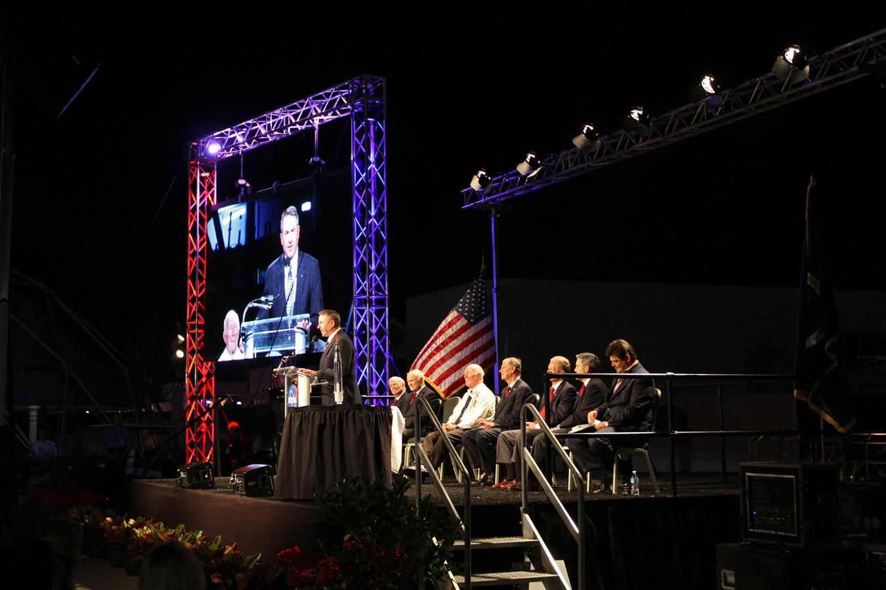 CAPE CANAVERAL, Fla. -- STS-95 astronaut Steve Robinson speaks during the "On Shoulders of Giants" program celebrating 50 years of Americans in orbit, an era which began with John Glenn's MA-6 mission on Feb. 20, 1962. The event was conducted in the Rocket Garden at the Kennedy Space Center Visitor Complex in Florida a few miles from the launch pad where Glenn and Scott Carpenter took flight in Mercury spacecraft.  Glenn's launch aboard an Atlas rocket took with it the hopes of an entire nation and ushered in a new era of space travel that eventually led to Americans walking on the moon by the end of the 1960s. Glenn soon was followed into orbit by Scott Carpenter, Walter Schirra and Gordon Cooper. Their fellow Mercury astronauts Alan Shepard and Virgil "Gus" Grissom flew earlier suborbital flights. Deke Slayton, a member of NASA's original Mercury 7 astronauts, was grounded by a medical condition until the Apollo-Soyuz Test Project in 1975. Photo credit: Kim Shiflett