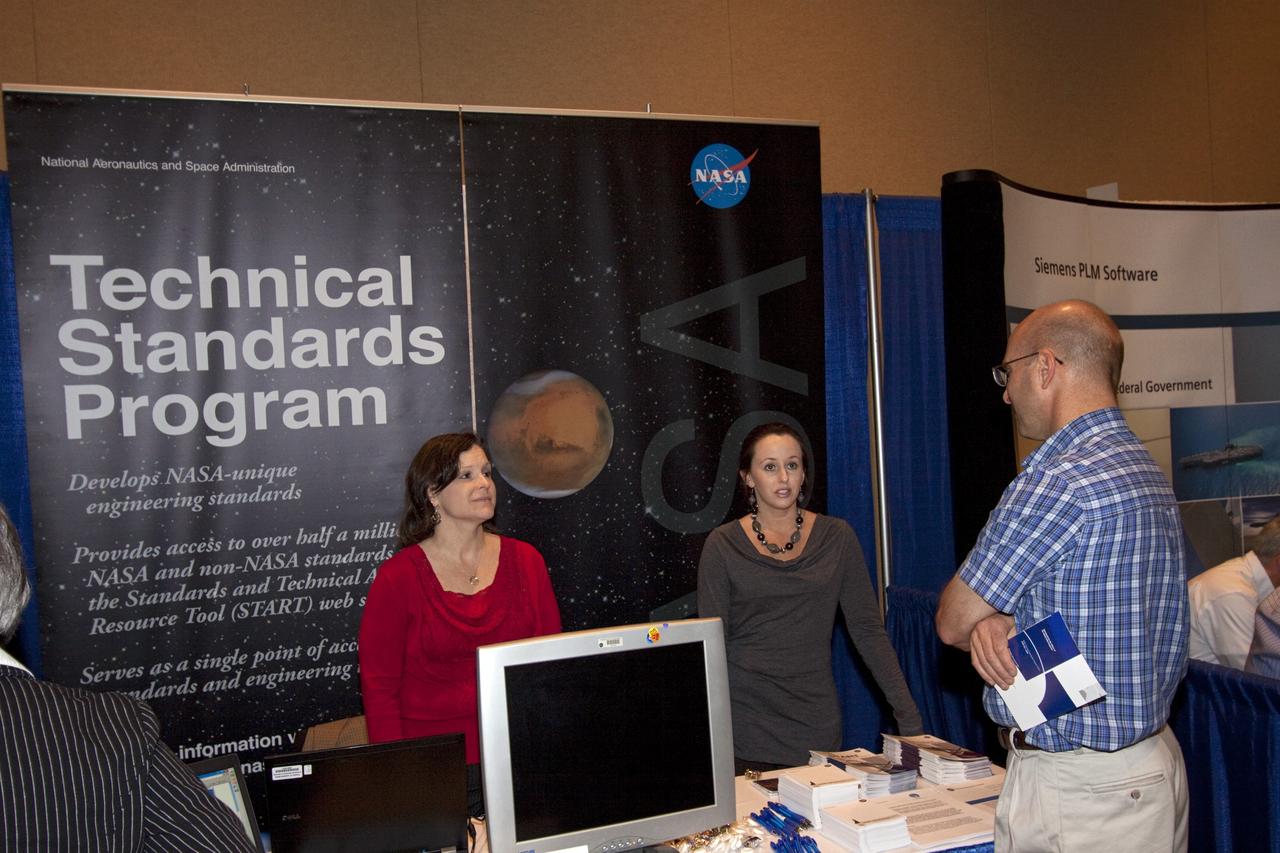 ORLANDO, Fla. -- NASA representatives provide information on the agency’s Technical Standards Program to participants in NASA’s Project Management Challenge 2012.    PM Challenge 2012 was held at the Caribe Royale Hotel and Convention Center in Orlando, Fla., on February 22-23, to provide a forum for all stakeholders in the project management community to meet and share stories, lessons learned and new uses of technology in the industry. The PM Challenge is sponsored by NASA's Office of the Chief Engineer. For additional information, visit http://www.nasa.gov/offices/oce/pmchallenge/index.html.  Photo credit: NASA/Jim Grossmann