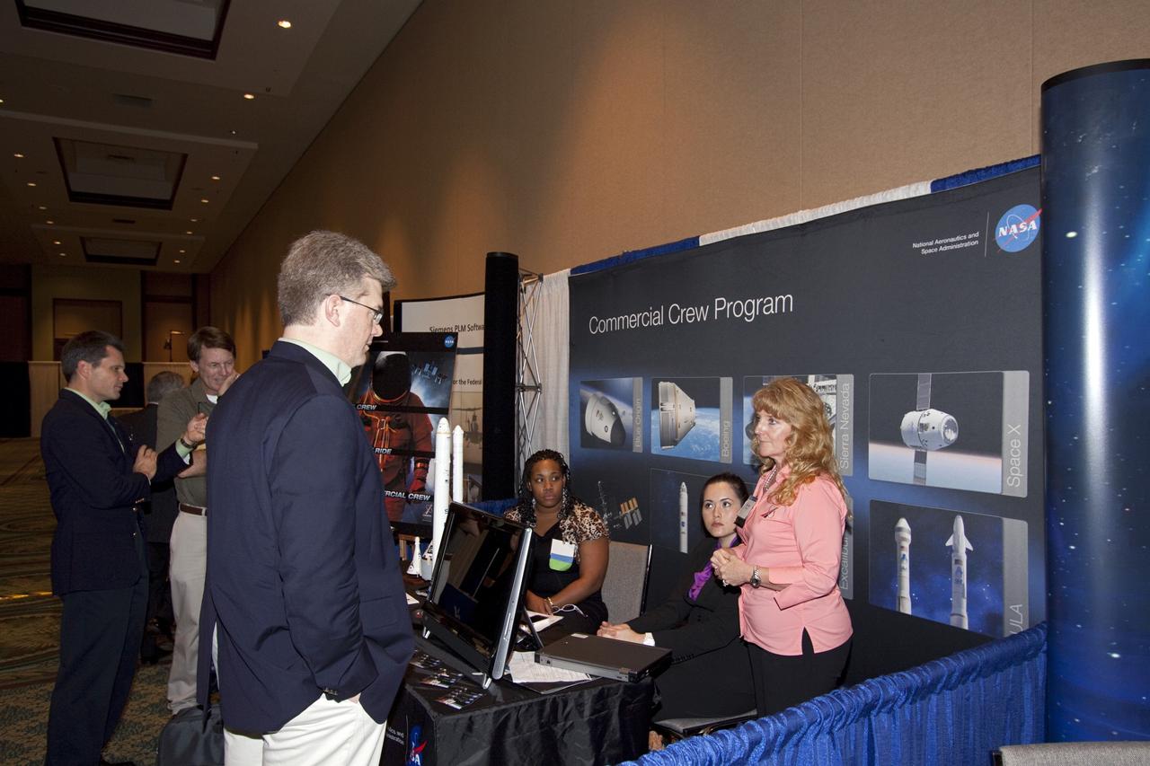 ORLANDO, Fla. -- Representatives from NASA’s Kennedy Space Center in Florida provide information on the Commercial Crew Program to participants in NASA’s Project Management Challenge 2012.    PM Challenge 2012 was held at the Caribe Royale Hotel and Convention Center in Orlando, Fla., on February 22-23, to provide a forum for all stakeholders in the project management community to meet and share stories, lessons learned and new uses of technology in the industry. The PM Challenge is sponsored by NASA's Office of the Chief Engineer. For additional information, visit http://www.nasa.gov/offices/oce/pmchallenge/index.html.  Photo credit: NASA/Jim Grossmann