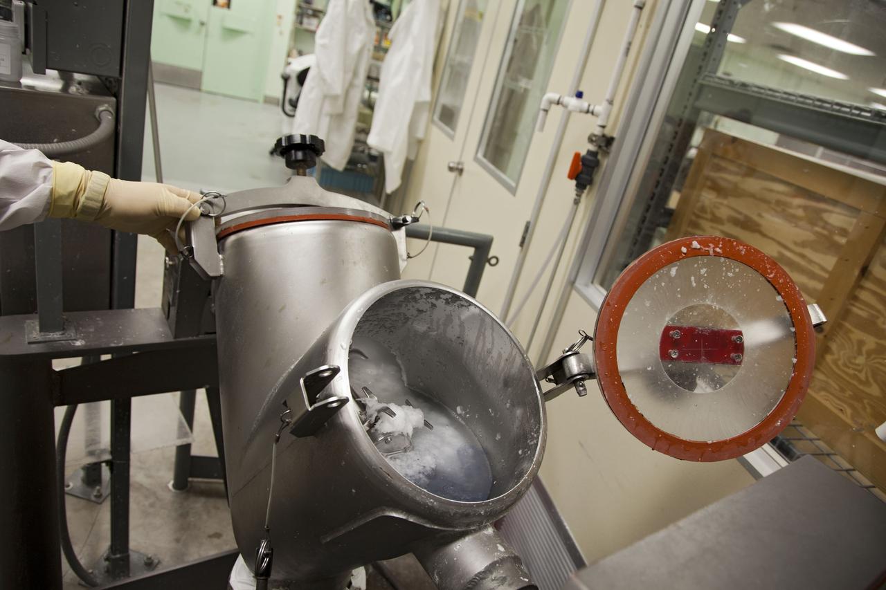 CAPE CANAVERAL, Fla. -- Chris Keeling, a United Space Alliance technician at NASA's Kennedy Space Center in Florida, manufactures the heat shield tiles that will be installed to the backshell of the Orion Multi-Purpose Crew Vehicle's Exploration Flight Test EFT-1 capsule. The work to manufacture and inspect the tiles is taking place in Kennedy's Thermal Protection System Facility. EFT-1 will be used during Orion's first test flight in space. For more information, visit www.nasa.gov/orion. Photo credit: Frankie Martin