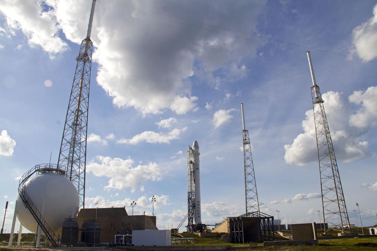 CAPE CANAVERAL, Fla. – The lightning protection system on Space Launch Complex-40 on Cape Canaveral Air Force Station in Florida is in place to protect a Falcon 9 rocket if a storm should develop following a wet dress rehearsal on March 1, which included loading the rocket with its propellants and a simulated countdown. Atop the rocket is a Dragon capsule. The new rocket and capsule were designed and manufactured by Space Exploration Technologies Corp., or SpaceX, for the company’s upcoming demonstration test flight for NASA’s Commercial Orbital Transportation Services, or COTS, program. Under COTS, NASA has partnered with two private companies to develop the capability to deliver cargo to the International Space Station. During the flight, SpaceX's Dragon capsule will conduct a series of checkout procedures that will test and prove its systems. These tests include rendezvous and berthing with the space station and are intended to lead to regular resupply missions to the station. Liftoff is targeted for April 30 at 12:22 p.m. EDT pending official approval at the Flight Readiness Review on April 16. For more information, visit www.nasa.gov/exploration/commercial/cargo/spacex_index.html. Photo credit: NASA/Cory Huston
