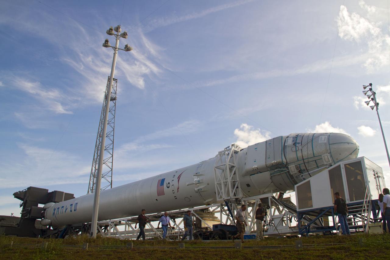 CAPE CANAVERAL, Fla. – The Falcon 9 rocket and its Dragon capsule are secured onto a transporter on Space Launch Complex-40 on Cape Canaveral Air Force Station in Florida. The rocket is being returned to the protection of its hangar following a wet dress rehearsal on the pad March 1, which included loading the rocket with its propellants and a simulated countdown. The new rocket and capsule were designed and manufactured by Space Exploration Technologies Corp., or SpaceX, for the company’s upcoming demonstration test flight for NASA’s Commercial Orbital Transportation Services, or COTS, program. Under COTS, NASA has partnered with two private companies to develop the capability to deliver cargo to the International Space Station. During the flight, SpaceX's Dragon capsule will conduct a series of checkout procedures that will test and prove its systems. These tests include rendezvous and berthing with the space station and are intended to lead to regular resupply missions to the station. Liftoff is targeted for April 30 at 12:22 p.m. EDT pending official approval at the Flight Readiness Review on April 16. For more information, visit www.nasa.gov/exploration/commercial/cargo/spacex_index.html. Photo credit: NASA/Cory Huston