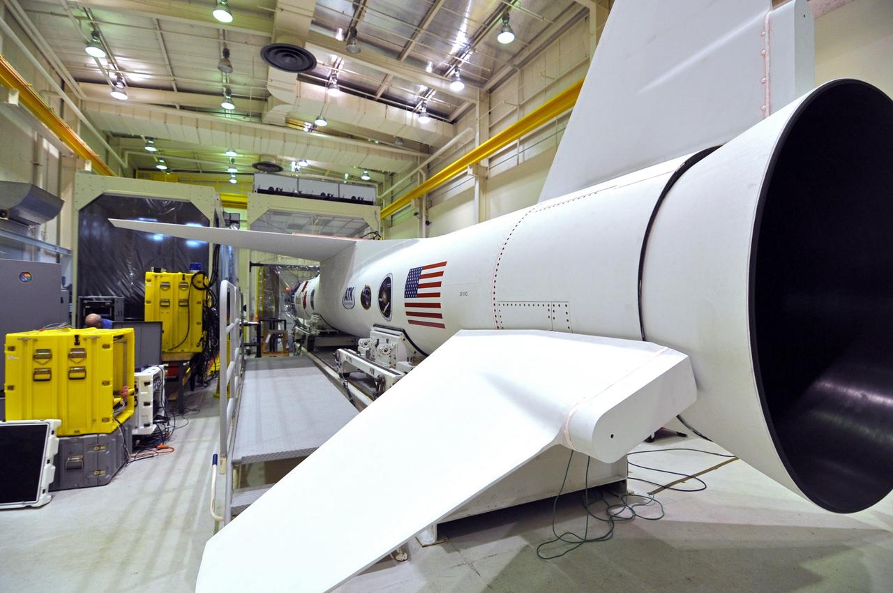 VANDENBERG AIR FORCE BASE, Calif. – Inside the Orbital Sciences processing facility at Vandenberg Air Force Base in California, processing of Orbital’s Pegasus XL rocket slated to launch NASA's Nuclear Spectroscopic Telescope Array, or NuSTAR, is nearly complete. The spacecraft has been mated with the rocket and enclosed in the Pegasus payload fairing on the forward end of the rocket, at center. The fairing will protect the spacecraft from the heat and aerodynamic pressure generated during the rocket’s ascent to orbit. After processing of the rocket and spacecraft are complete, they will be flown on Orbital's L-1011 carrier aircraft from Vandenberg to the Ronald Reagan Ballistic Missile Defense Test Site on the Pacific Ocean’s Kwajalein Atoll for launch in March. The high-energy X-ray telescope will conduct a census of black holes, map radioactive material in young supernovae remnants, and study the origins of cosmic rays and the extreme physics around collapsed stars. For more information, visit http://www.nasa.gov/nustar. Photo credit: NASA/Randy Beaudoin, VAFB