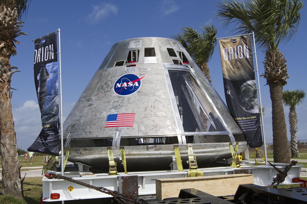 VIERA, Fla. – A full-scale test version of NASA's new Orion Multi-Purpose Crew Vehicle displayed outside the Space Coast Stadium greets those attending the stadium’s Space Day. Bob Cabana, director of NASA’s Kennedy Space Center in Florida, was on hand to throw the first pitch of a spring training game between Major League Baseball's Washington Nationals and the Houston Astros. Kennedy also set up a booth at the stadium for the occasion to highlight some of the contributions the space agency has made to sports, transportation and everyday life. For more information, visit http://www.nasa.gov/kennedy. Photo credit: NASA/Kim Shiflett