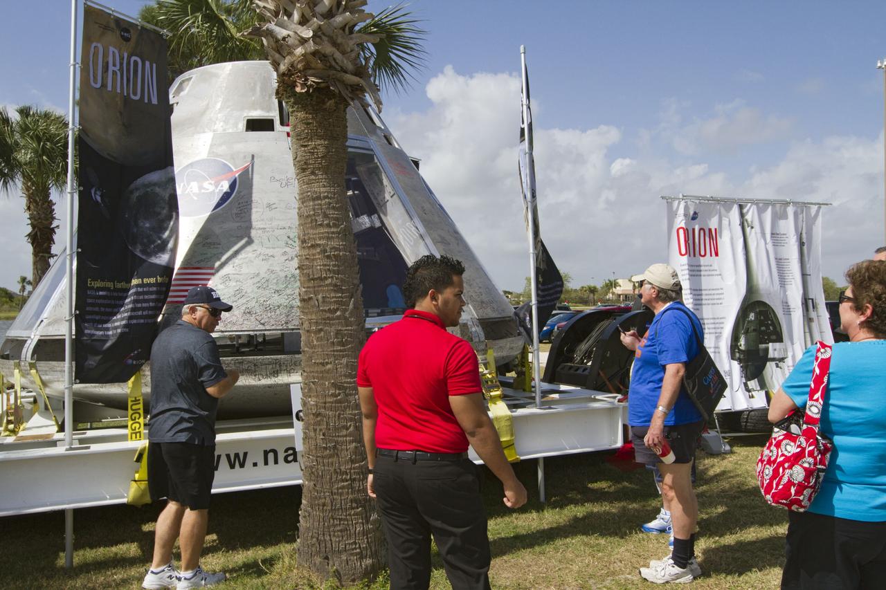 VIERA, Fla. – The public gets a close view of a full-scale test version of NASA's new Orion Multi-Purpose Crew Vehicle on display outside the Space Coast Stadium at the stadium’s Space Day. Bob Cabana, director of NASA’s Kennedy Space Center in Florida, was on hand to throw the first pitch of a spring training game between Major League Baseball's Washington Nationals and the Houston Astros. Kennedy also set up a booth at the stadium for the occasion to highlight some of the contributions the space agency has made to sports, transportation and everyday life. For more information, visit http://www.nasa.gov/kennedy. Photo credit: NASA/Kim Shiflett