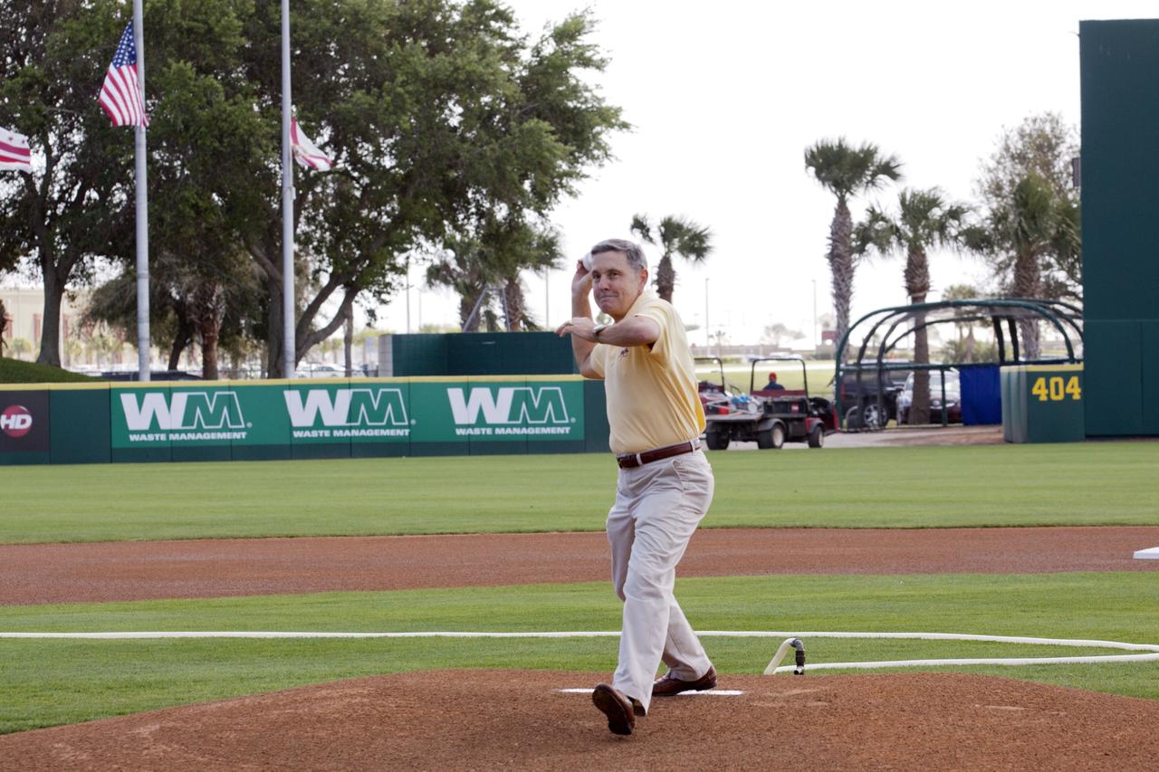 VIERA, Fla. – Bob Cabana, director of NASA’s Kennedy Space Center in Florida, throws the first pitch of a spring training game between Major League Baseball's Washington Nationals and the Houston Astros on Space Day at the Space Coast Stadium. Kennedy set up a booth at the stadium for the occasion to highlight some of the contributions the space agency has made to sports, transportation and everyday life. A full-scale test version of NASA's new Orion Multi-Purpose Crew Vehicle also was located outside the stadium to show the public the spacecraft under development that will take astronauts farther into space than ever before. For more information, visit http://www.nasa.gov/kennedy. Photo credit: NASA/Kim Shiflett