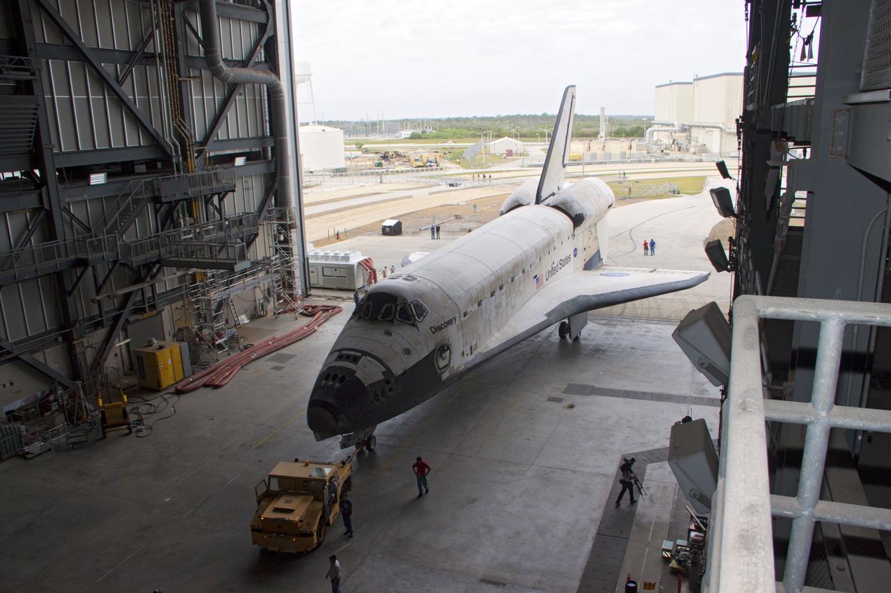 CAPE CANAVERAL, Fla. – At NASA’s Kennedy Space Center in Florida, space shuttle Discovery is towed inside the Vehicle Assembly Building VAB after being towed from Orbiter Processing Facility-1. The work is part of the Space Shuttle Program’s transition and retirement processing of shuttle Discovery, which is being prepared for display at Smithsonian’s National Air and Space Museum, Steven F. Udvar-Hazy Center in Chantilly, Va. Discovery will remain in high bay 4 of the VAB until its scheduled transport atop a NASA Shuttle Carrier Aircraft modified 747 jet to Dulles International Airport in Virginia on April 17. Discovery will then be transported to the Smithsonian on April 19. For more information, visit http://www.nasa.gov/shuttle. Photo credit: NASA/Jim Grossmann