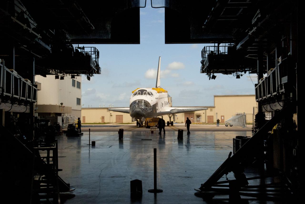 CAPE CANAVERAL, Fla. – At NASA’s Kennedy Space Center in Florida, space shuttle Atlantis has been towed to the doors of Orbiter Processing Facility-1 after being towed from the Vehicle Assembly Building. The work is part of the Space Shuttle Program’s transition and retirement processing of the three space shuttles. Atlantis is being prepared for display at the Kennedy Space Center Visitor Complex and is scheduled to rollover to the complex in November. Photo credit: NASA/Tim Jacobs