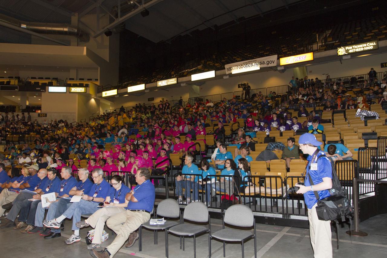 ORLANDO, Fla. -- High school teams compete in the regional FIRST robotics competition at the University of Central Florida in Orlando, Fla. More than 60 teams took part in the competition called "For Inspiration and Recognition of Science and Technology," or FIRST, in hopes of advancing to the national robotics championship. This year, the competition resembled a basketball game and was dubbed "Rebound Rumble." The game measured the effectiveness of each robot, the power of collaboration and the determination of the teams. On the left is Team 3502, called "The Octo Pie-Rates," which is comprised of students from School for Arts and Innovative Learning SAIL High School in Tallahassee. On the right is Team 3164, called "Tiger Robotics," which is comprised of students from Jesuit and The Academy of the Holy Names high schools in Tampa, Fla.    FIRST, founded in 1989, is a non-profit organization that designs accessible, innovative programs to build self-confidence, knowledge and life skills while motivating young people to pursue academic opportunities. The robotics competition challenges teams of high school students and their mentors to solve a common problem in a six-week timeframe using a standard kit of parts and a common set of rules. NASA is the largest sponsor of the international program. Kennedy Space Center is a sponsor of the regional event. For more information on Kennedy's education events and initiatives, go to http://www.nasa.gov/offices/education/centers/kennedy/home/index.html. Photo credit: NASA/Kim Shiflett