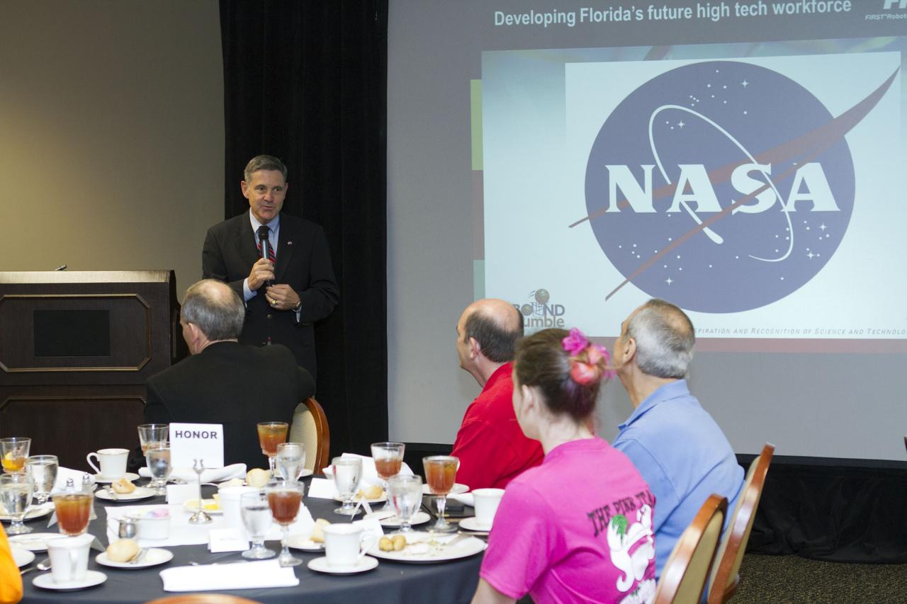 ORLANDO, Fla. -- NASA Kennedy Space Center Director Bob Cabana talks to teams that are participating in the regional FIRST robotics competition at the University of Central Florida in Orlando, Fla. More than 60 high school teams took part in the competition called "For Inspiration and Recognition of Science and Technology," or FIRST, in hopes of advancing to the national robotics championship. This year, the competition resembled a basketball game and was dubbed "Rebound Rumble." The game measured the effectiveness of each robot, the power of collaboration and the determination of the teams.    FIRST, founded in 1989, is a non-profit organization that designs accessible, innovative programs to build self-confidence, knowledge and life skills while motivating young people to pursue academic opportunities. The robotics competition challenges teams of high school students and their mentors to solve a common problem in a six-week timeframe using a standard kit of parts and a common set of rules. NASA is the largest sponsor of the international program. Kennedy Space Center is a sponsor of the regional event. For more information on Kennedy's education events and initiatives, go to http://www.nasa.gov/offices/education/centers/kennedy/home/index.html. Photo credit: NASA/Kim Shiflett
